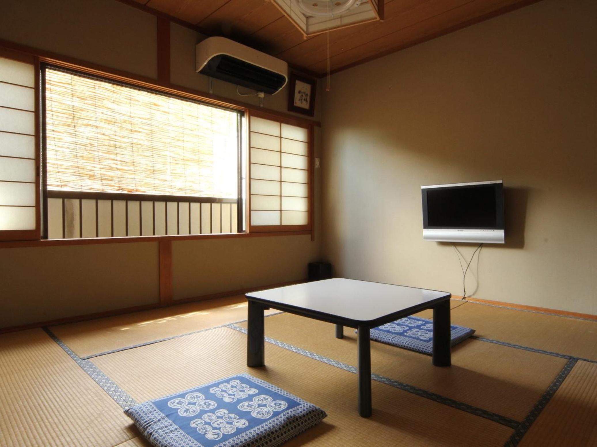 Quadruple Room - Photo 1