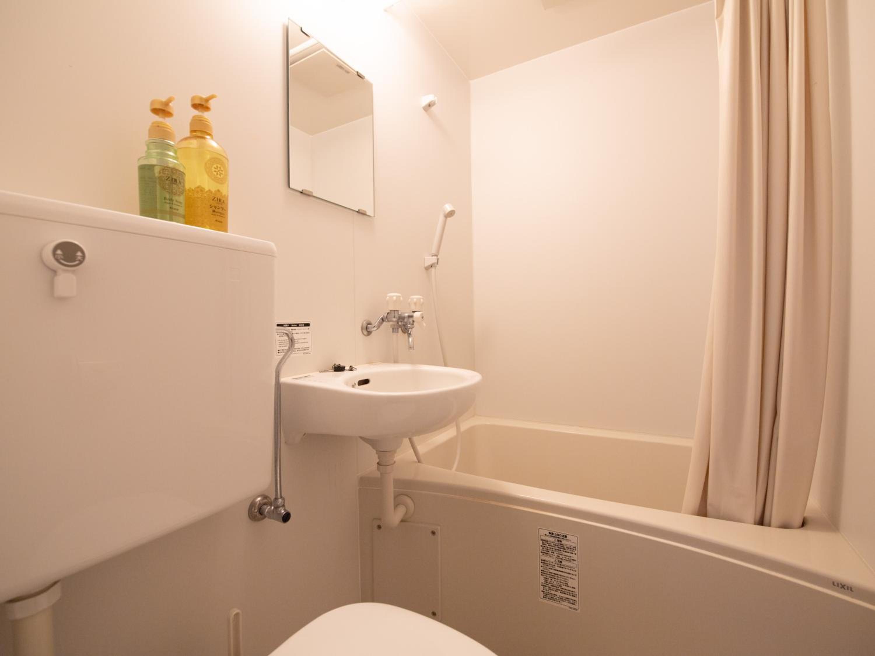 Standard Twin Room - Photo 10