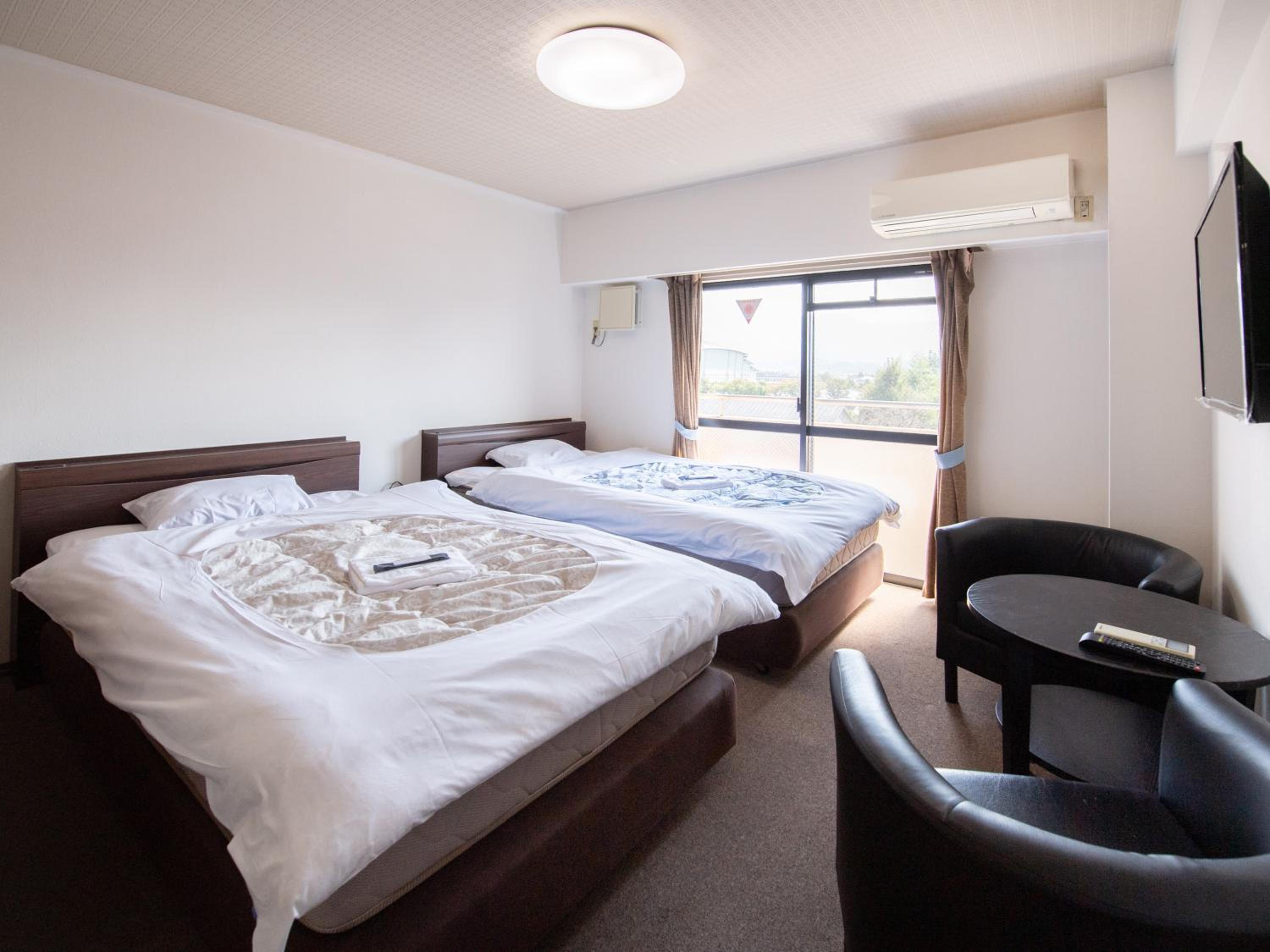 Standard Twin Room - Photo 9