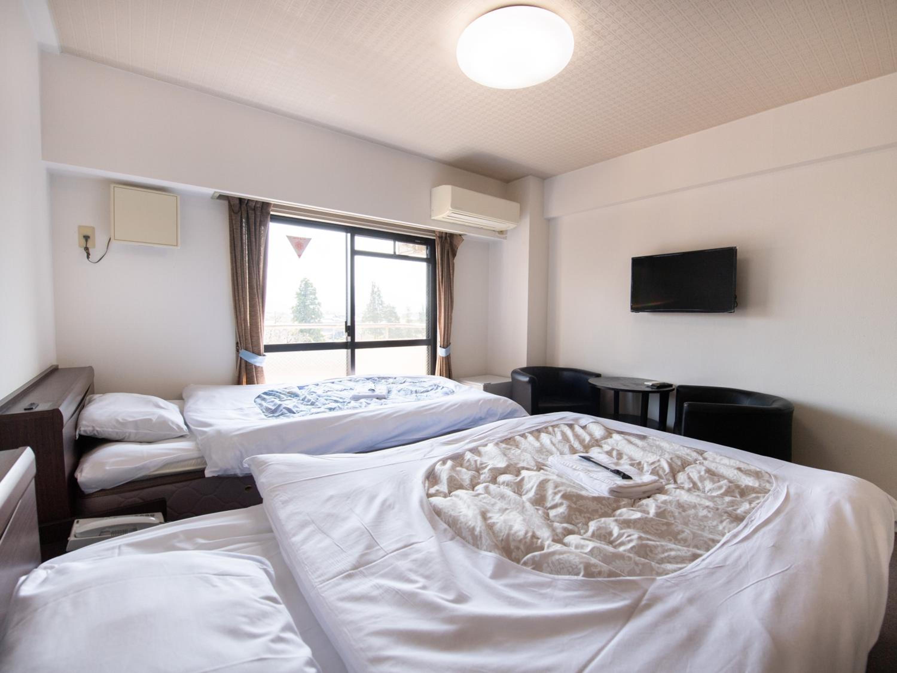 Standard Twin Room - Photo 1