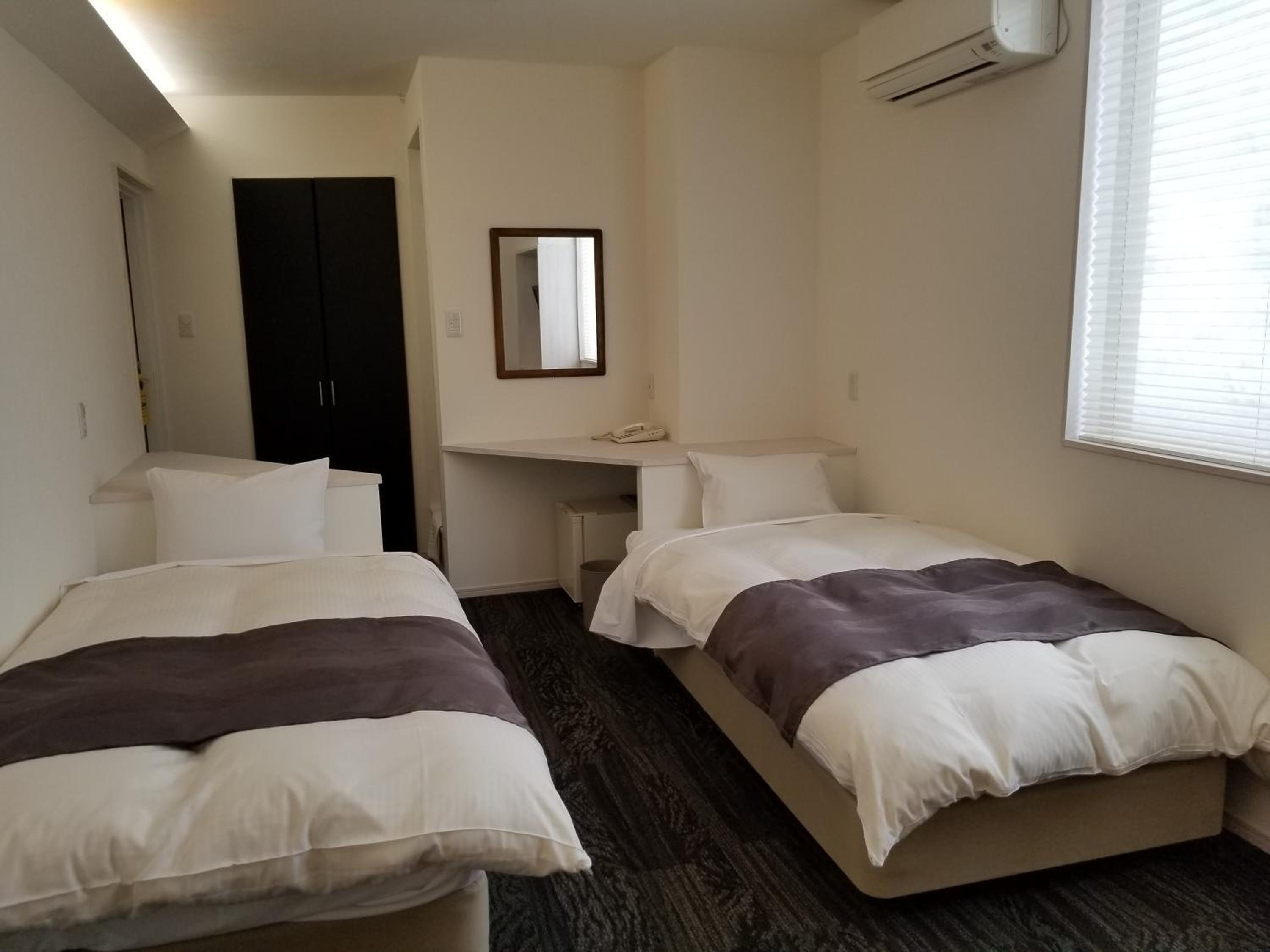 Twin Room with Private Bathroom