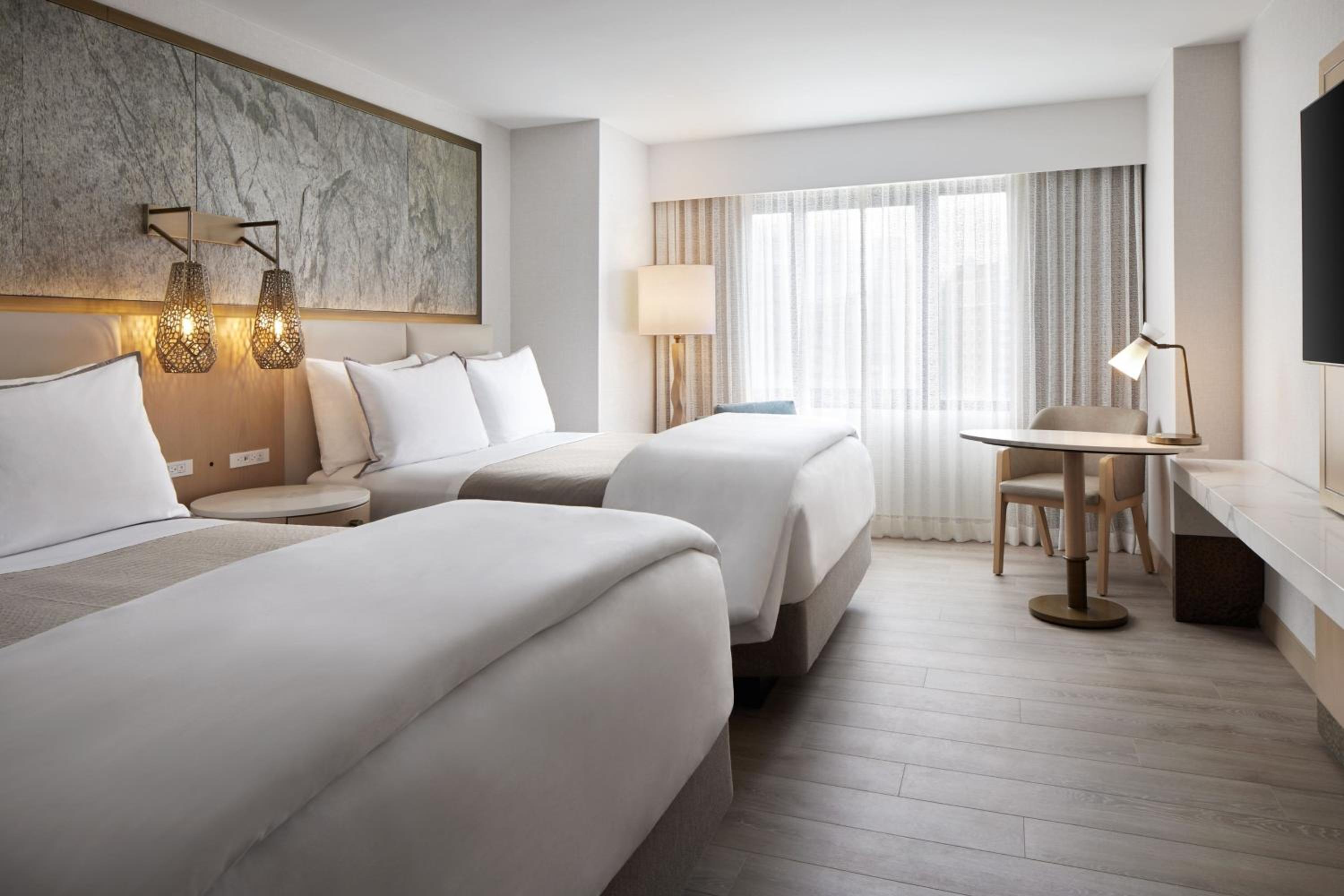 Deluxe Queen Room with Two Queen Beds - Photo 1
