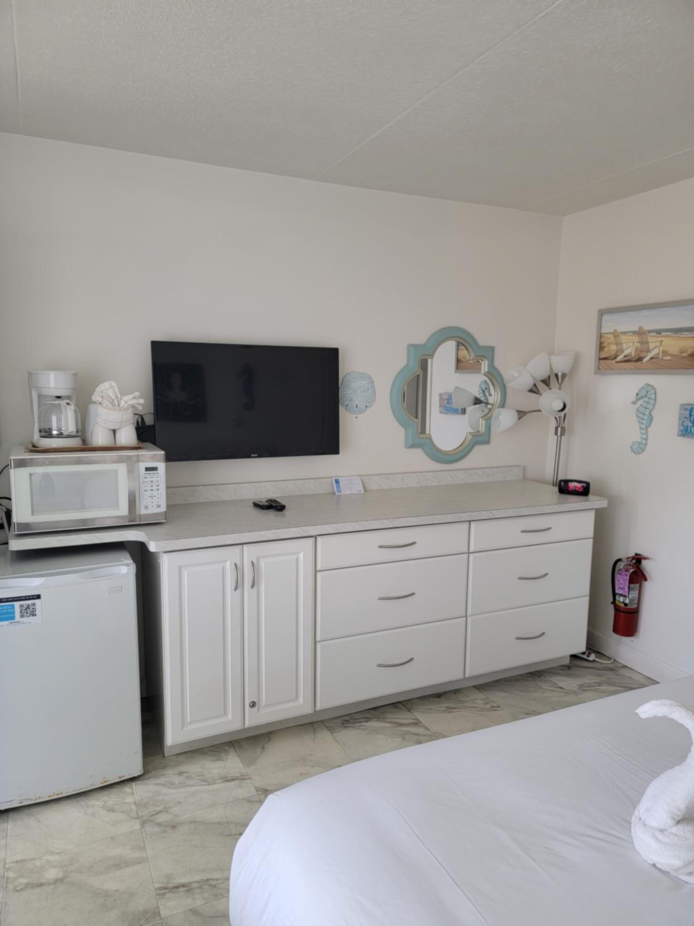 Poolside motel room with a king bed