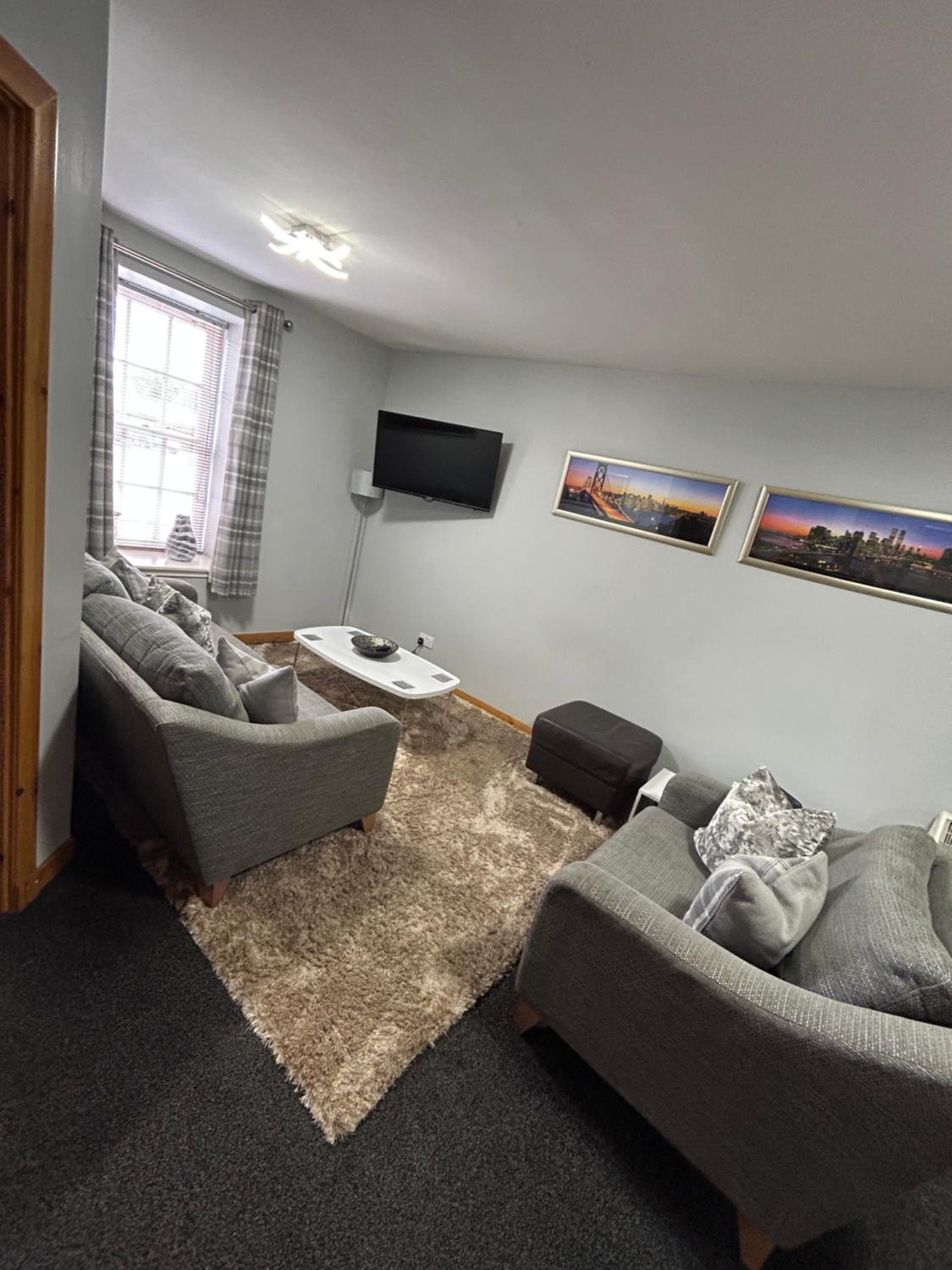 Three-Bedroom Apartment photo 1