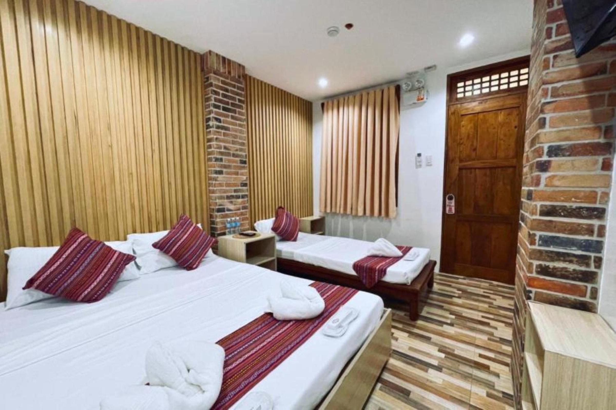 Deluxe Triple Room - Photo 1