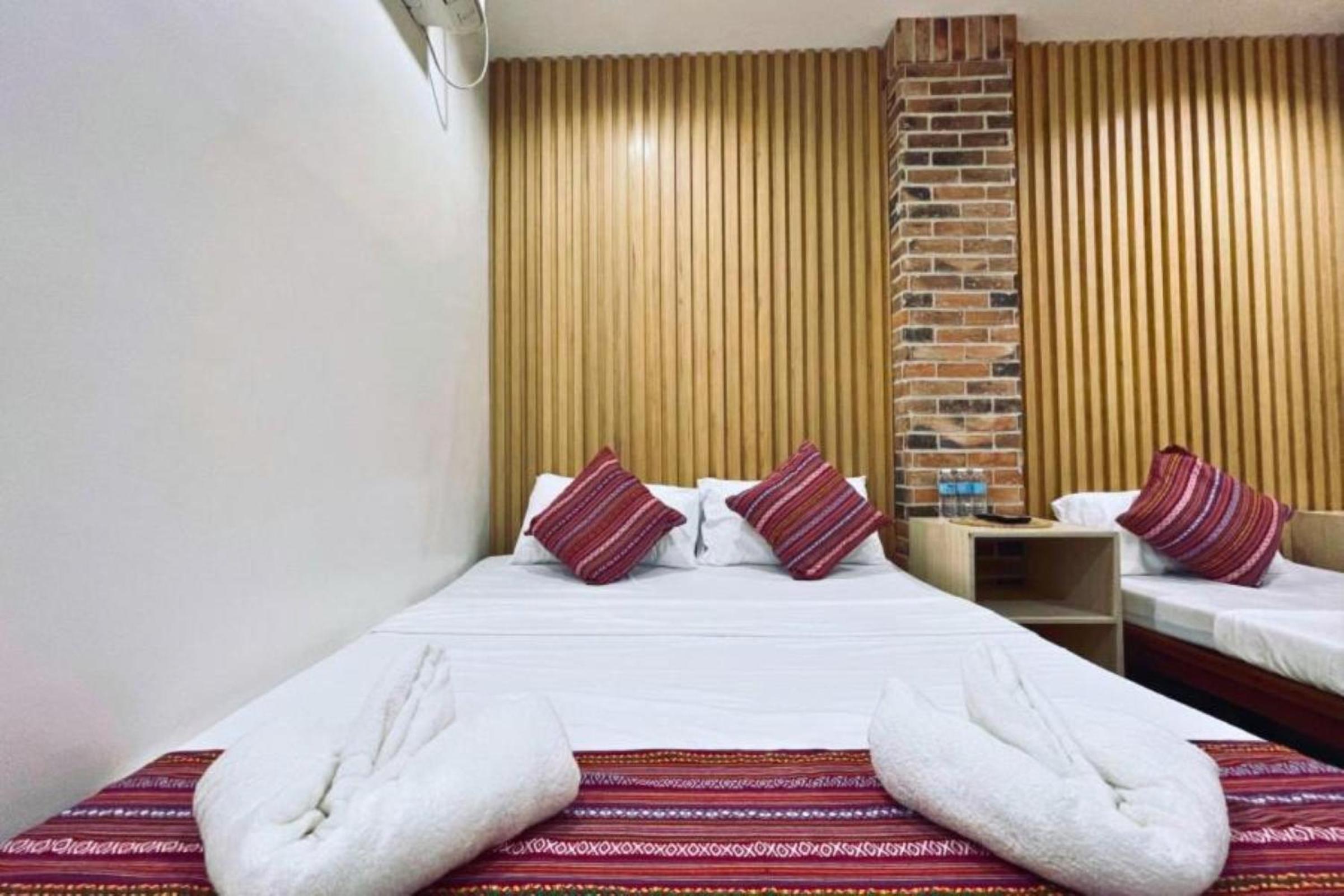 Deluxe Triple Room - Photo 11