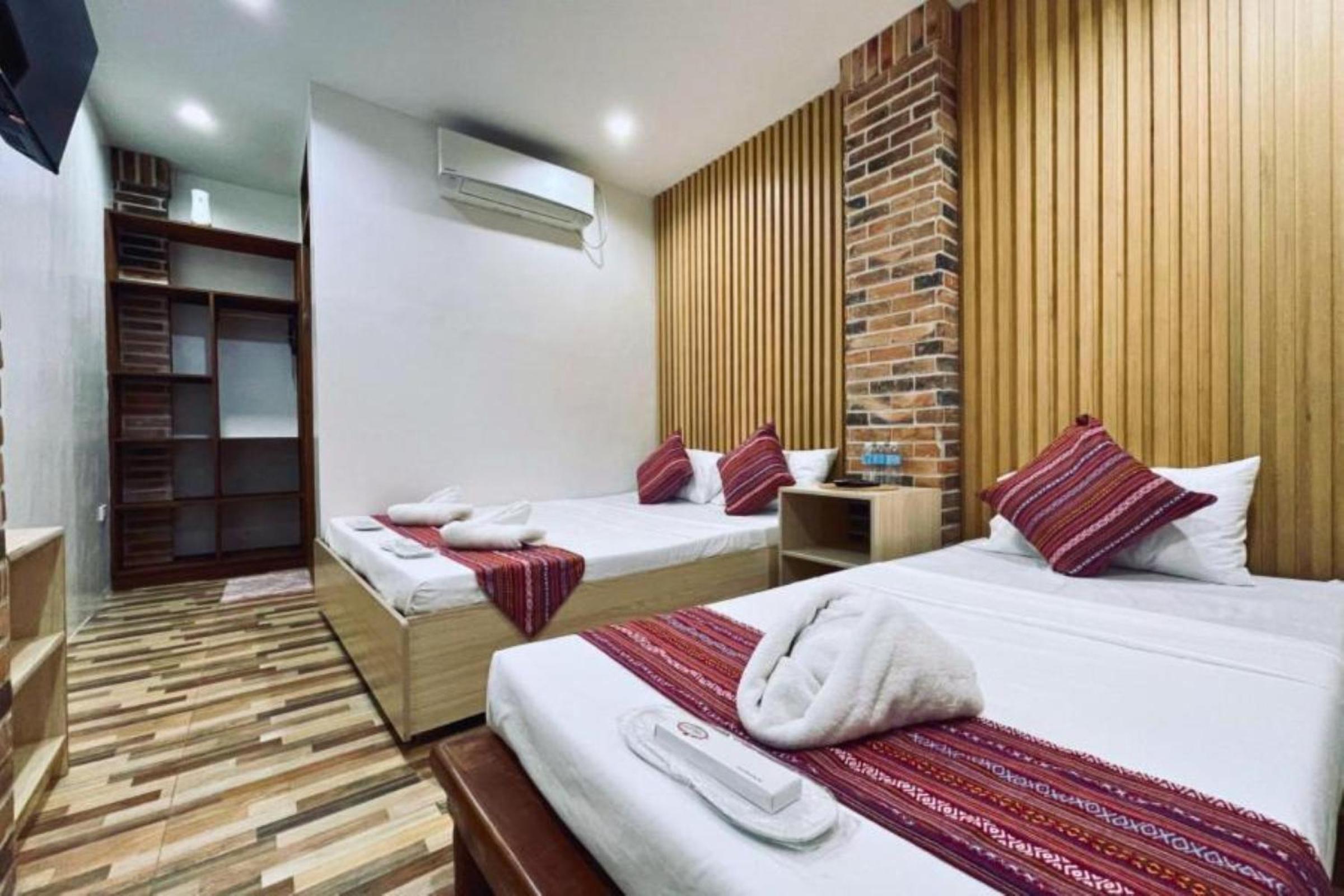 Deluxe Triple Room - Photo 8