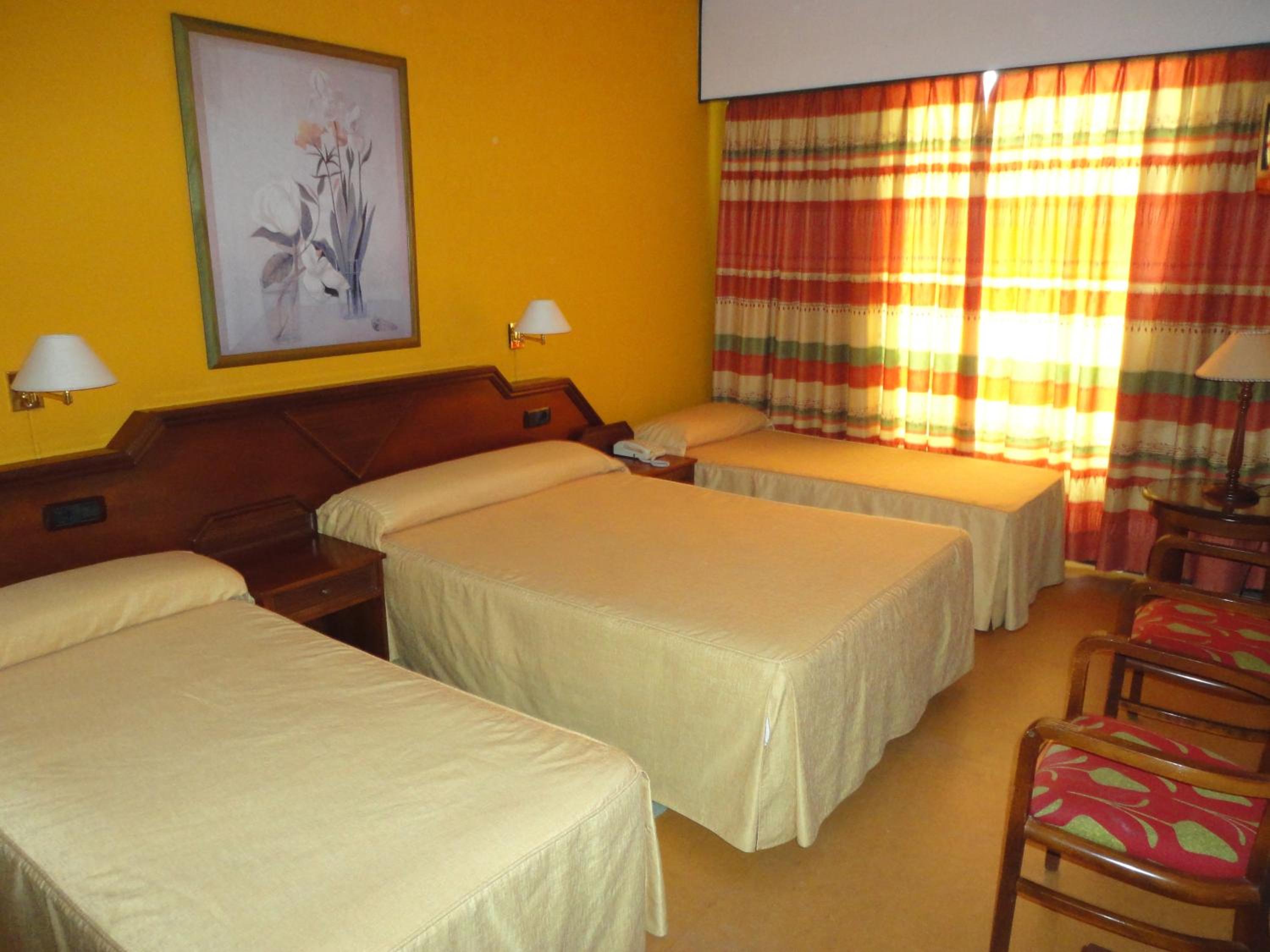 Double Room with 2 Extra Beds (2 Adults + 2 Children)