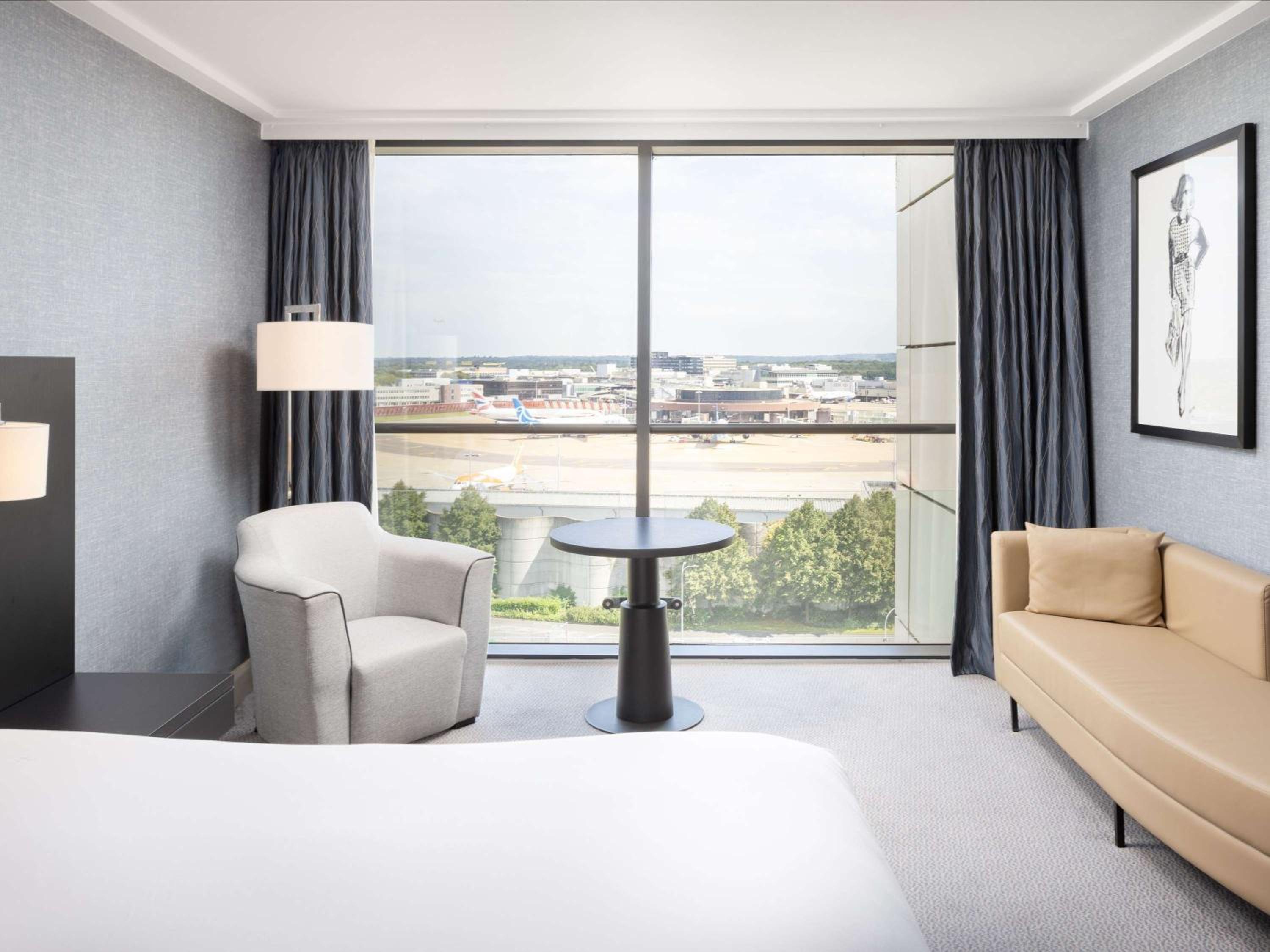 Superior Queen Room with Runway View