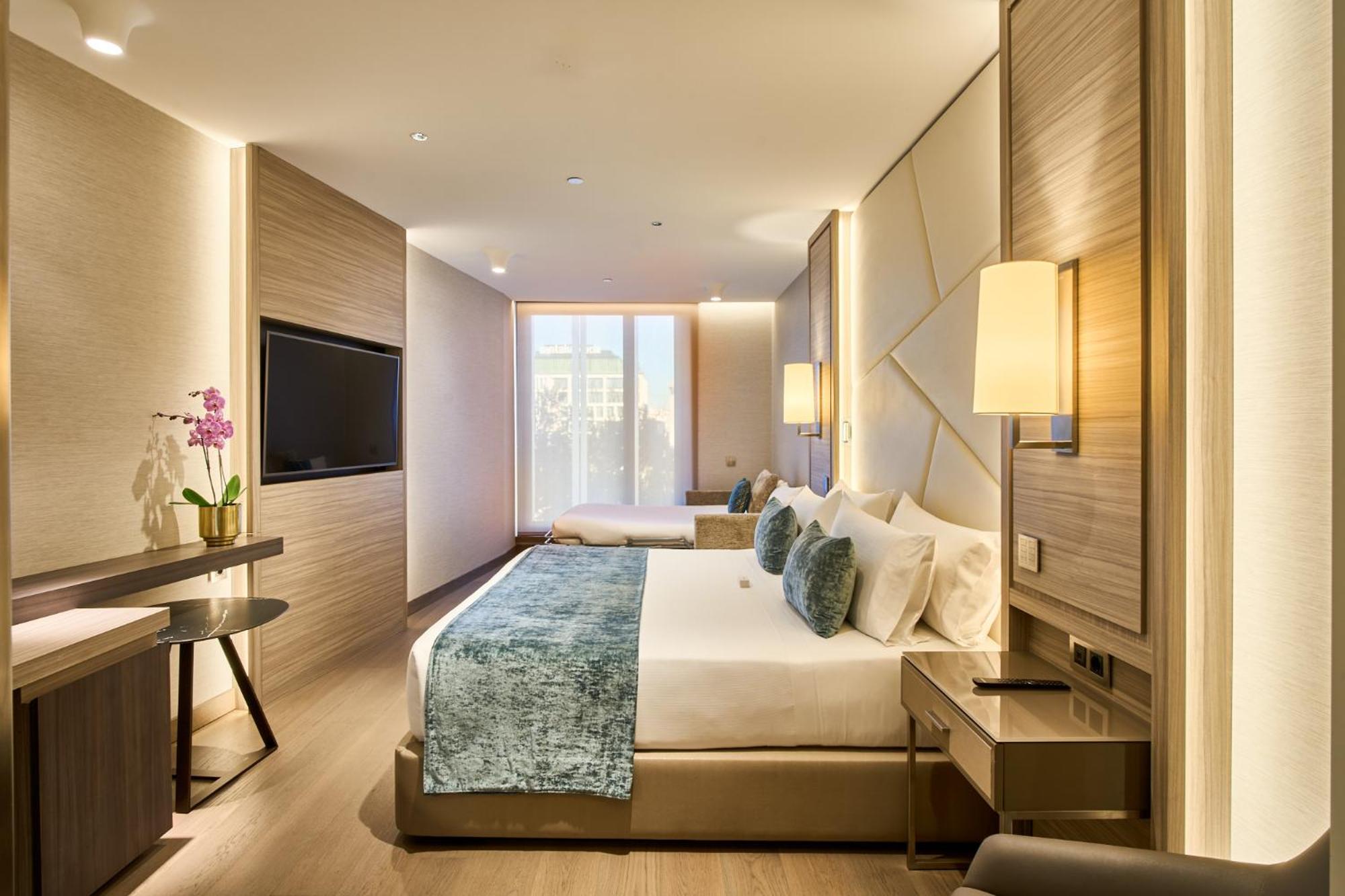 Deluxe Triple Room - Photo 4