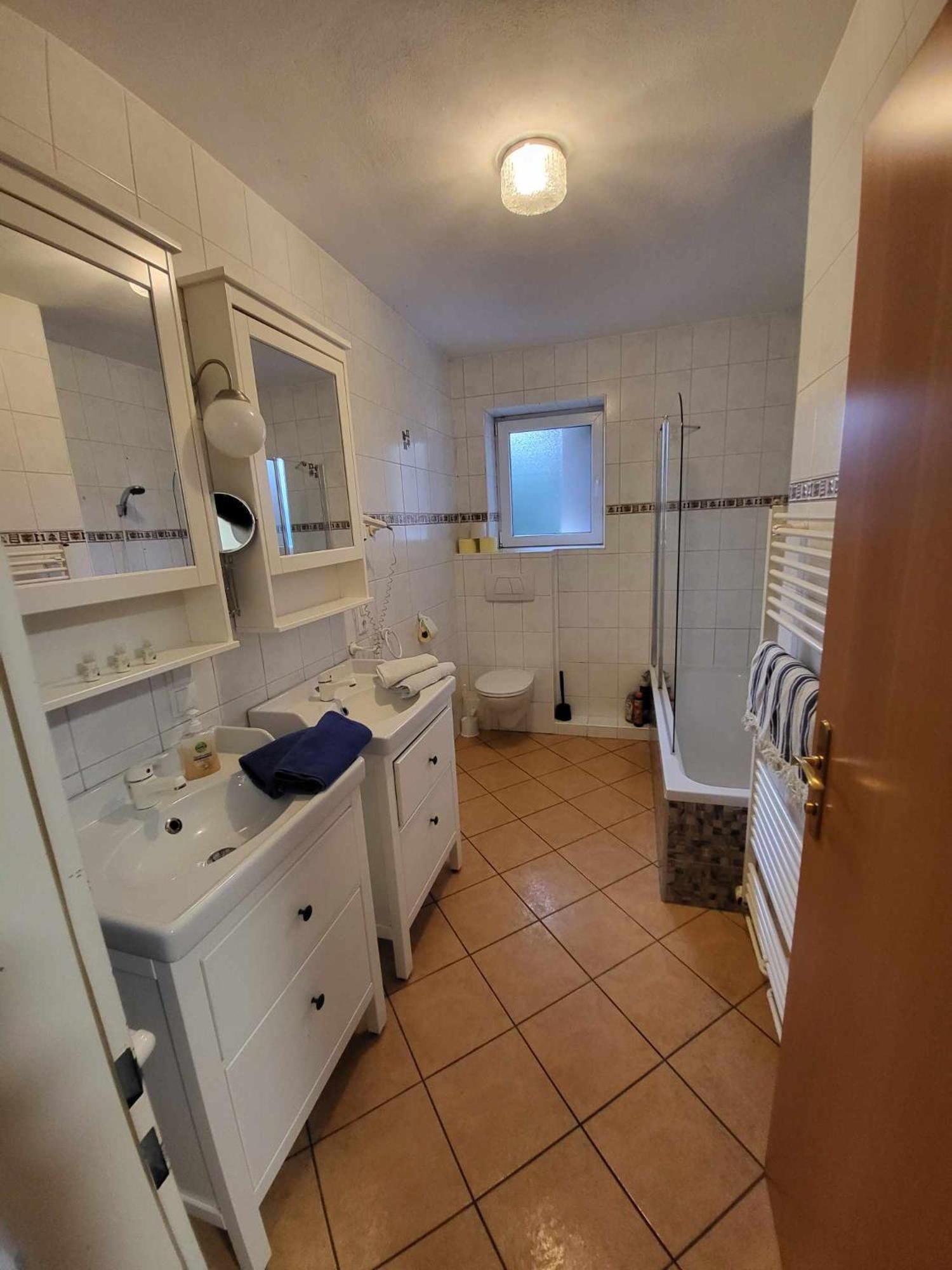 Three-Bedroom Apartment - Photo 12