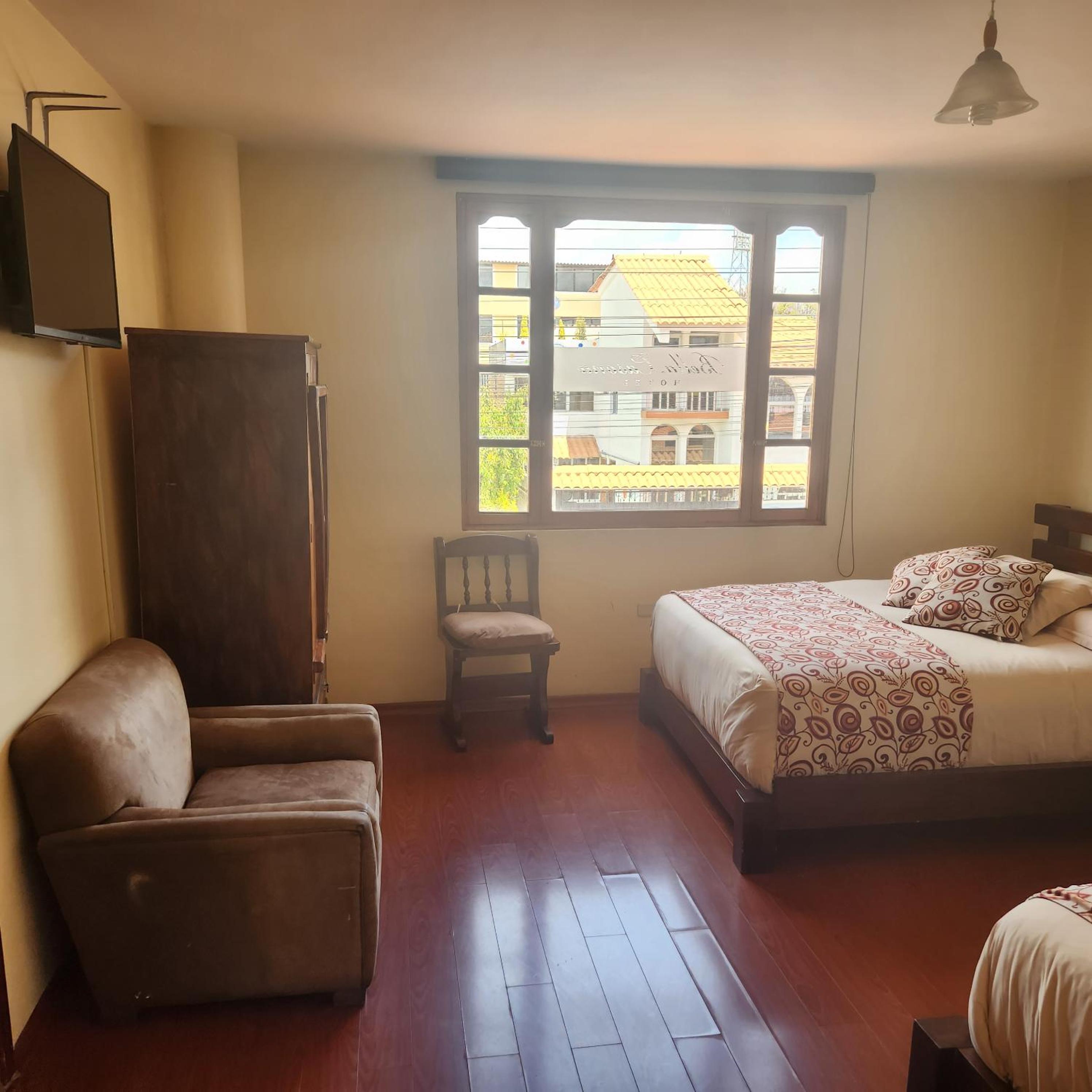 Deluxe Double Room (2 Adults + 1 Child) photo 2