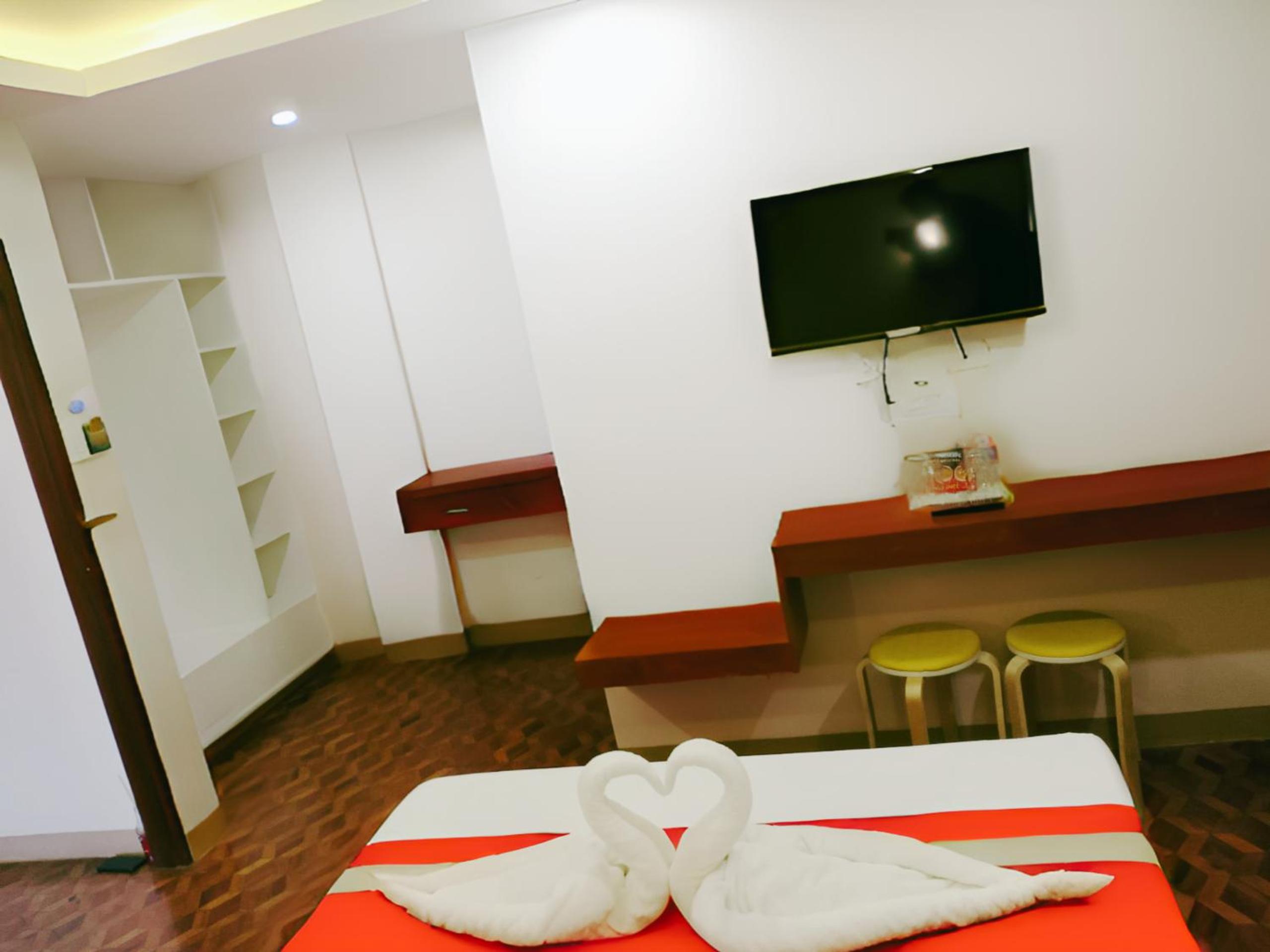 Deluxe Room - Photo 2