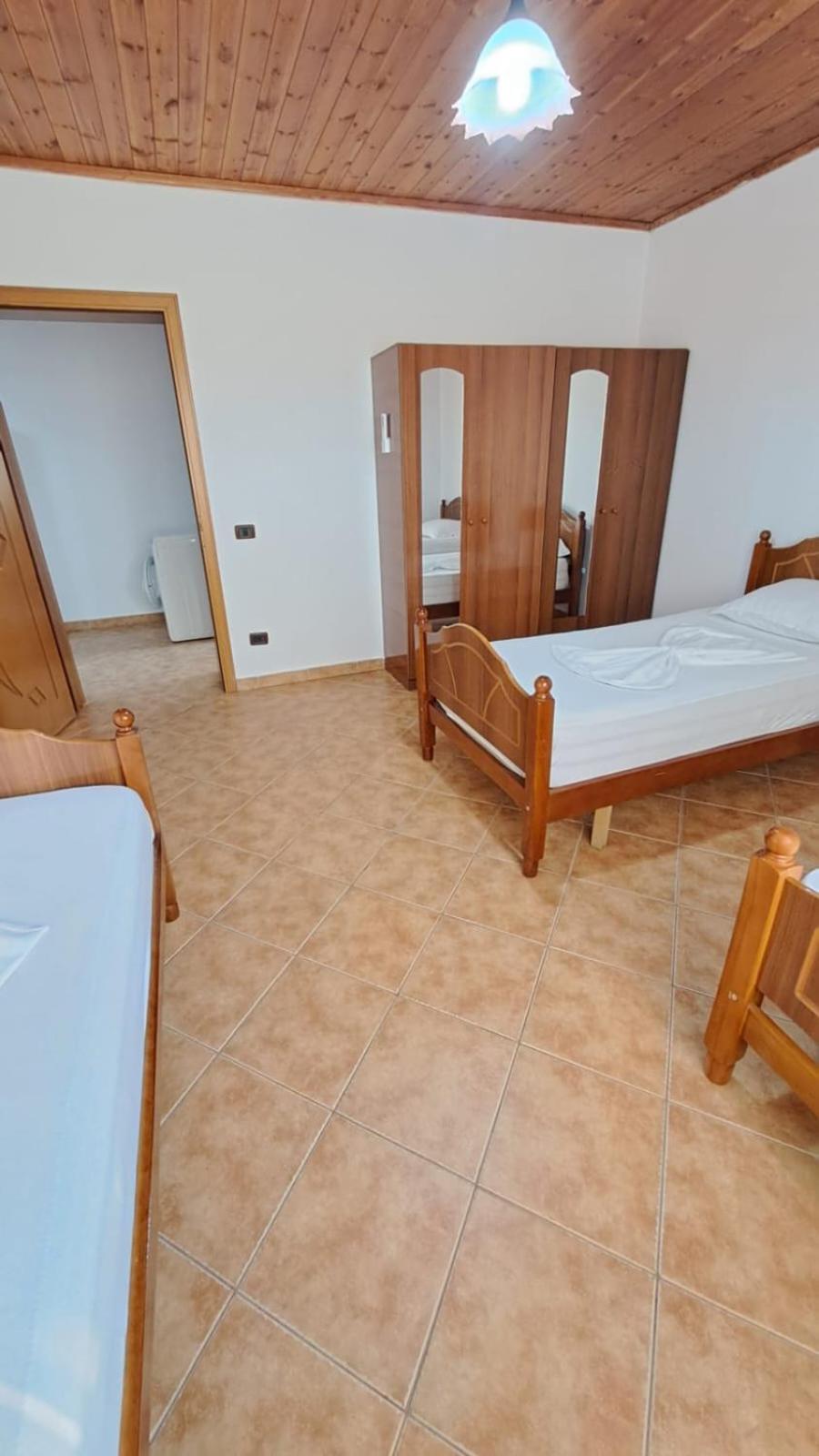 Single Bed In Dormitory Room