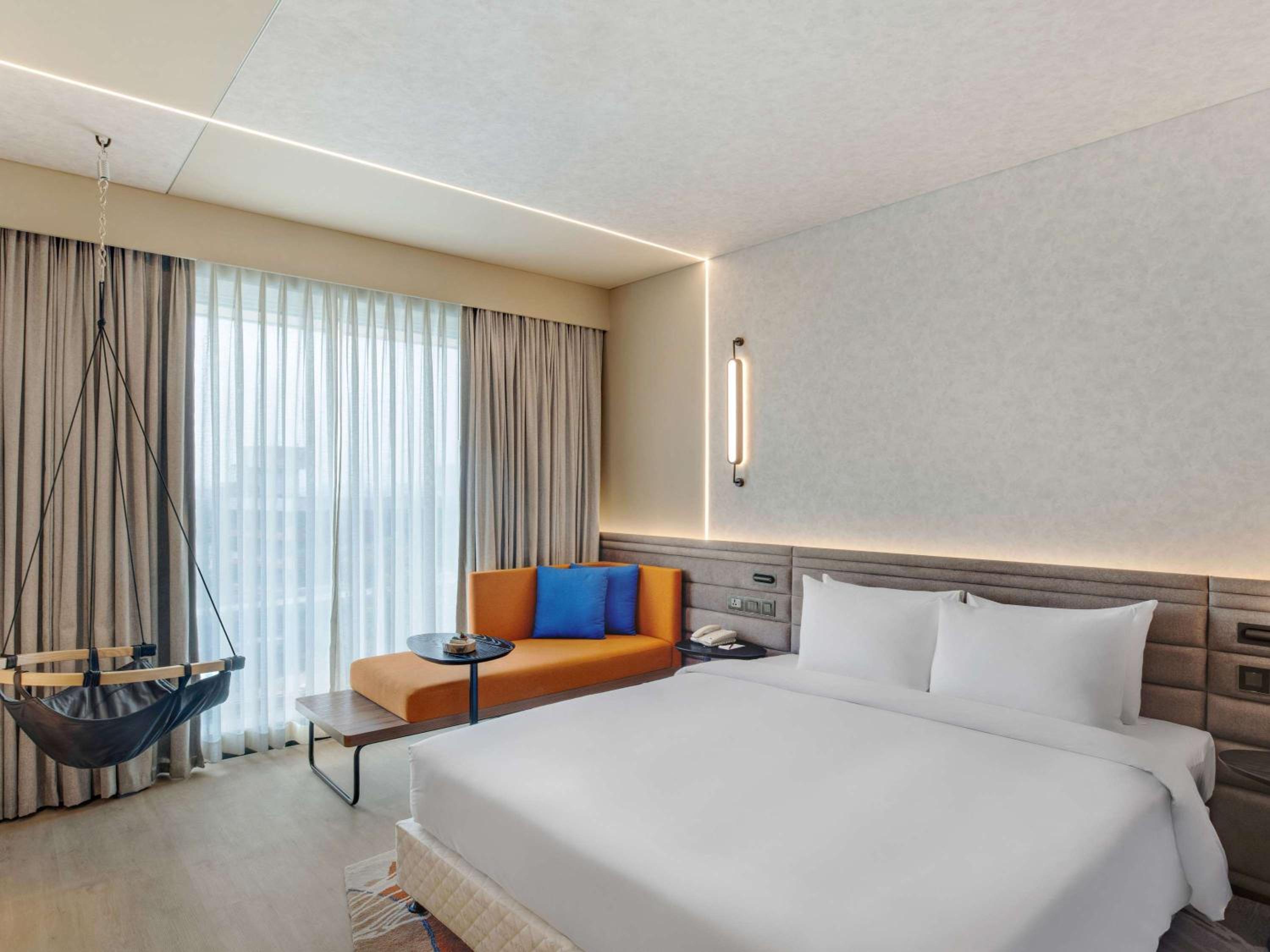 Premier King Room with Complimentary IMFL from 6:00 pm to 8 pm at Barcode and Shared Airport Transfer - Photo 1