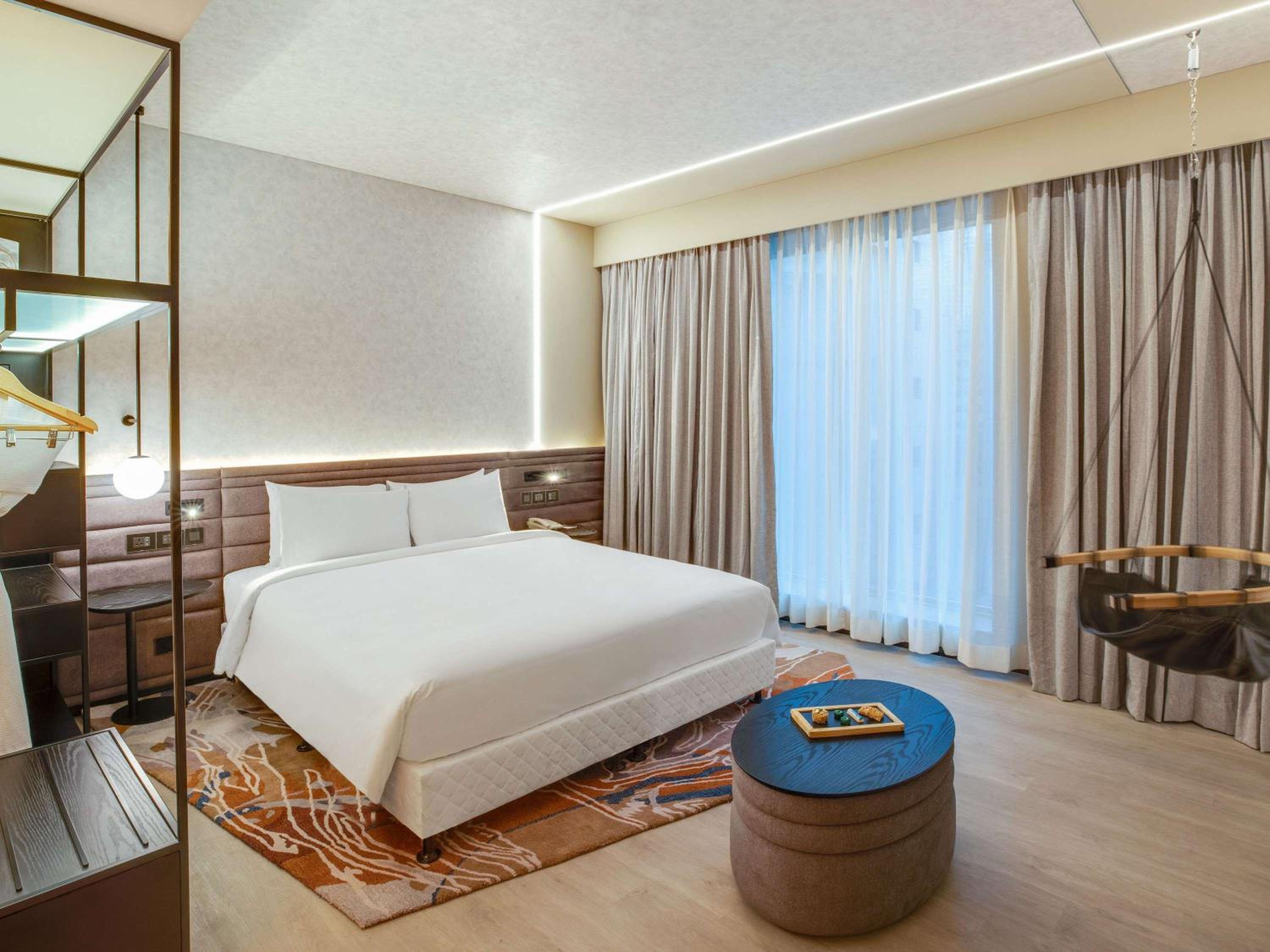 Premier Suite with Complimentary IMFL from 6:00 pm to 8 pm at Barcode and Two Way Airport Transfer photo 1