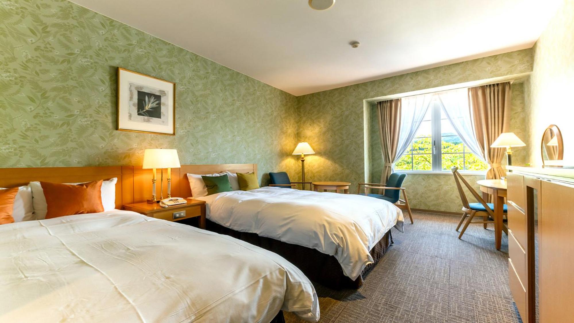 Twin Room with Extra Bed - Non-Smoking photo 2