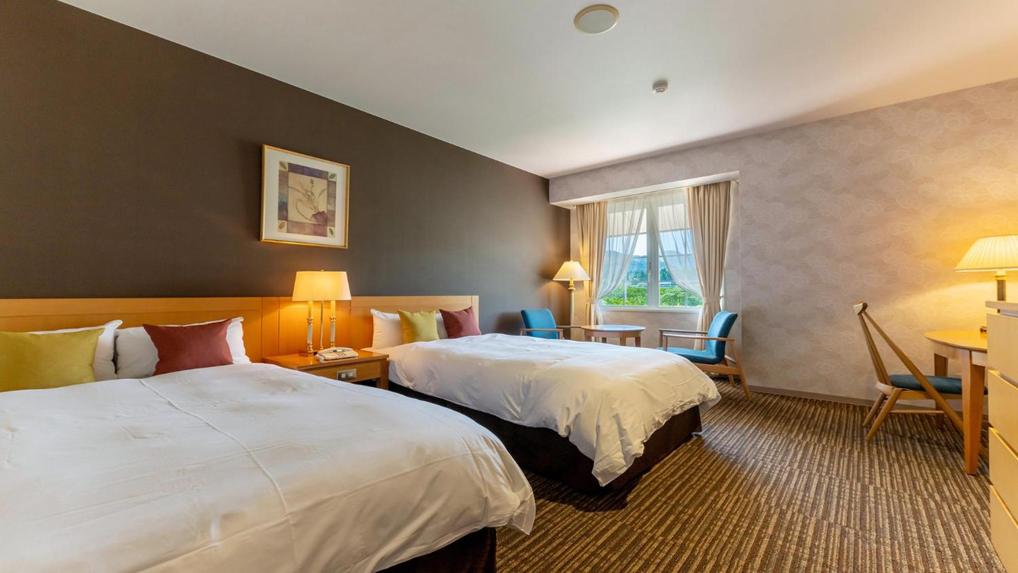Twin Room with Extra Bed - Non-Smoking photo 3