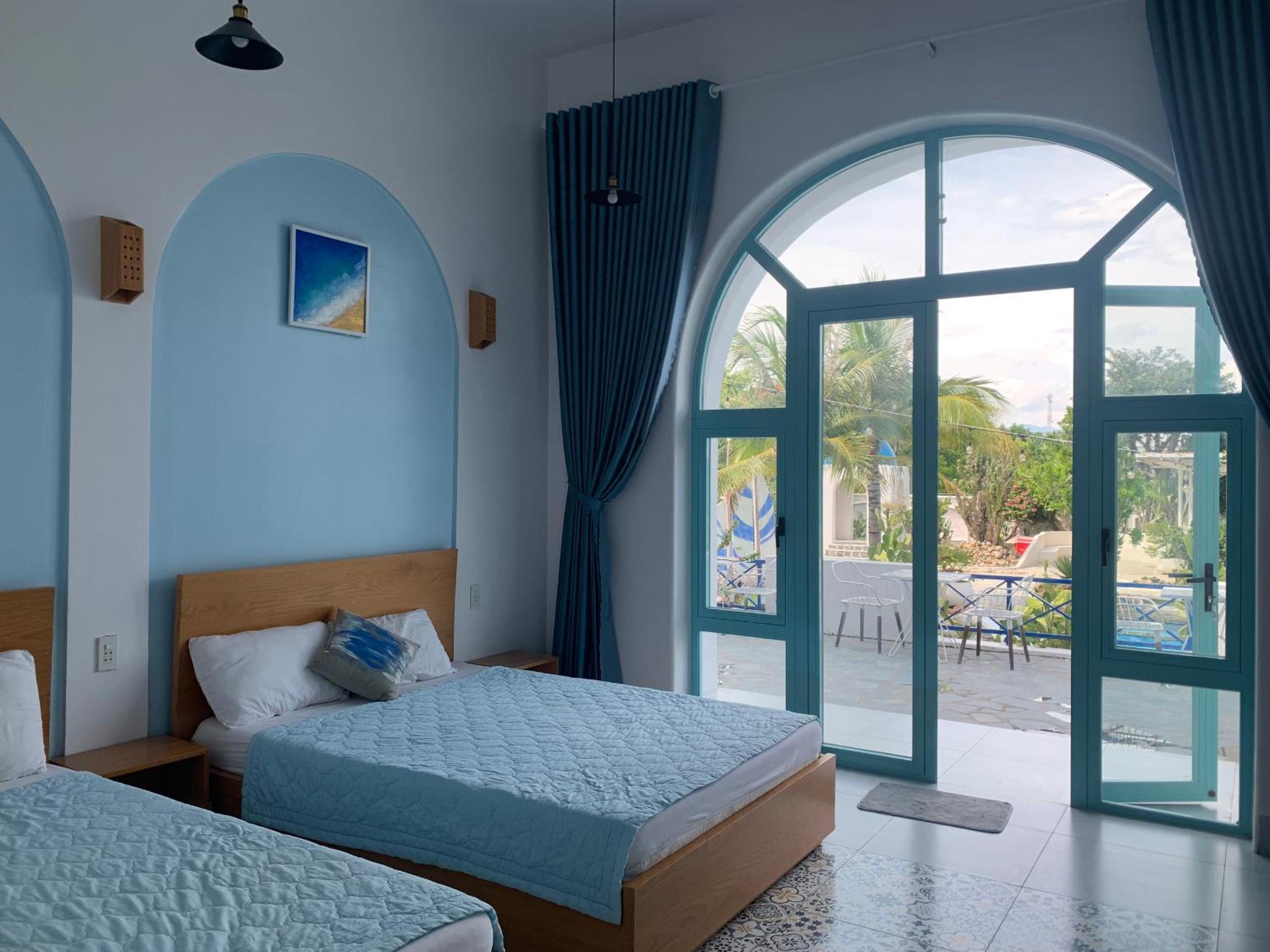 Deluxe Quadruple Room - Photo 6