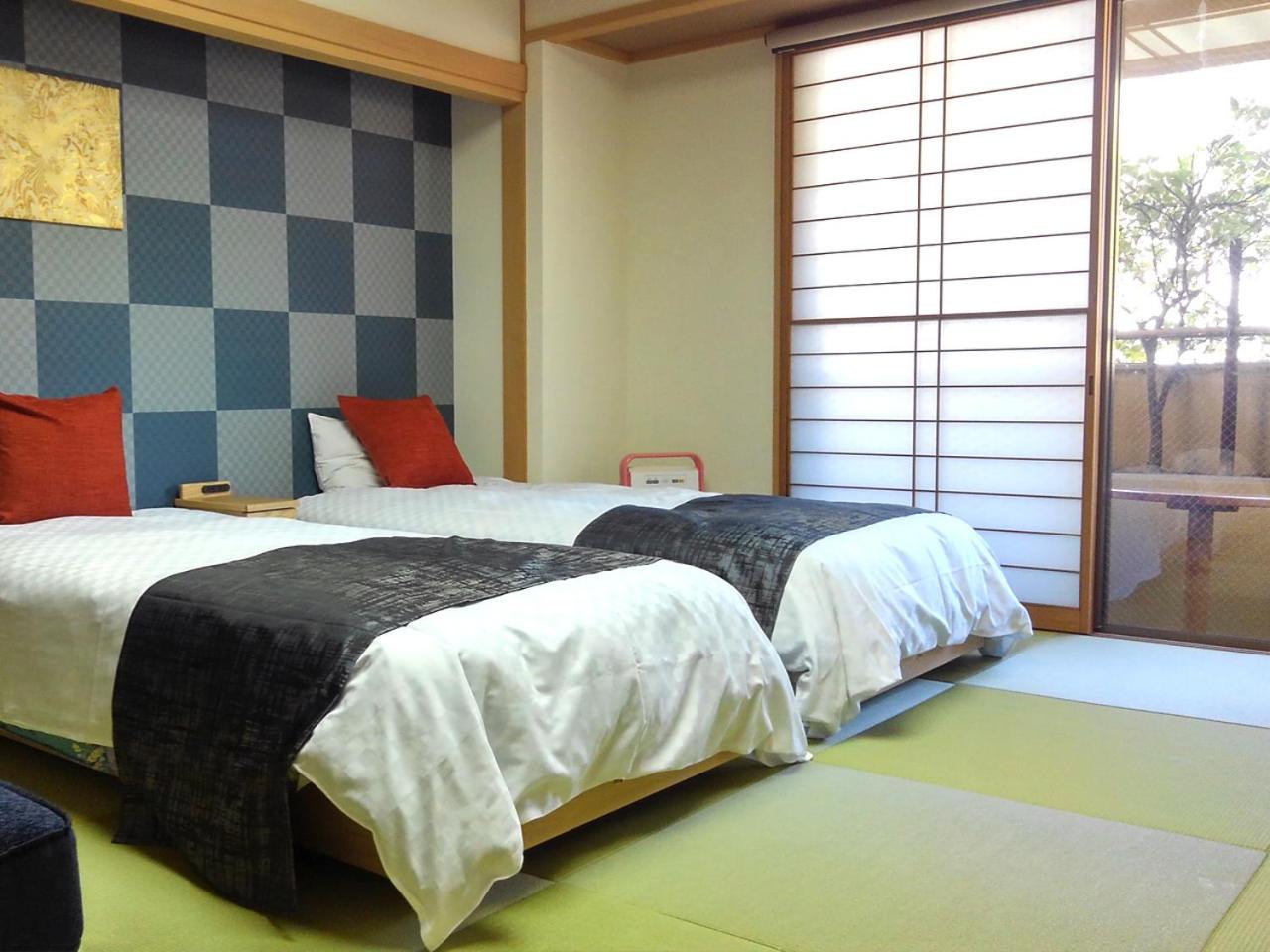 Twin Room with Tatami Area - Nonsmoking - Breakfast Included photo 1
