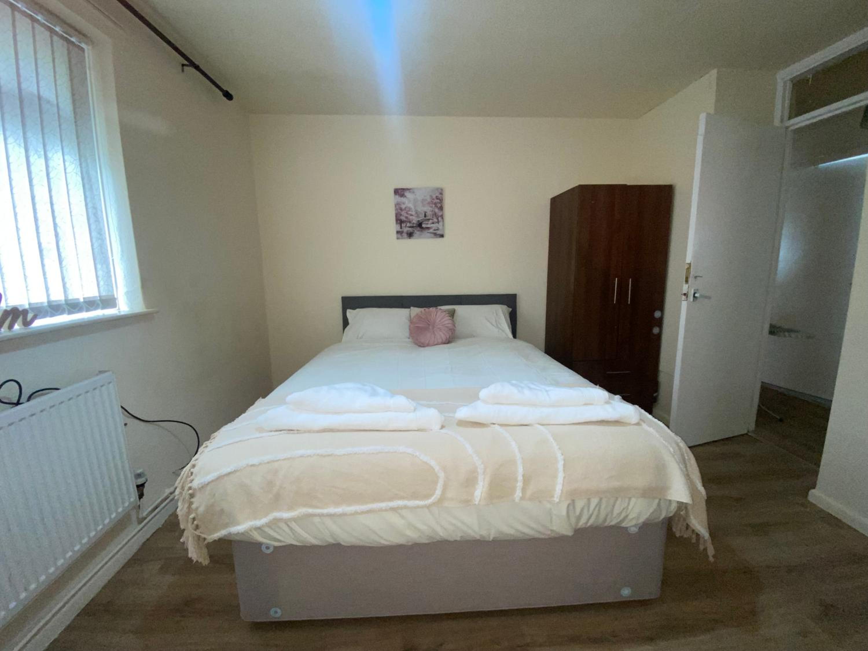 Queen Room With Shared Bathroom