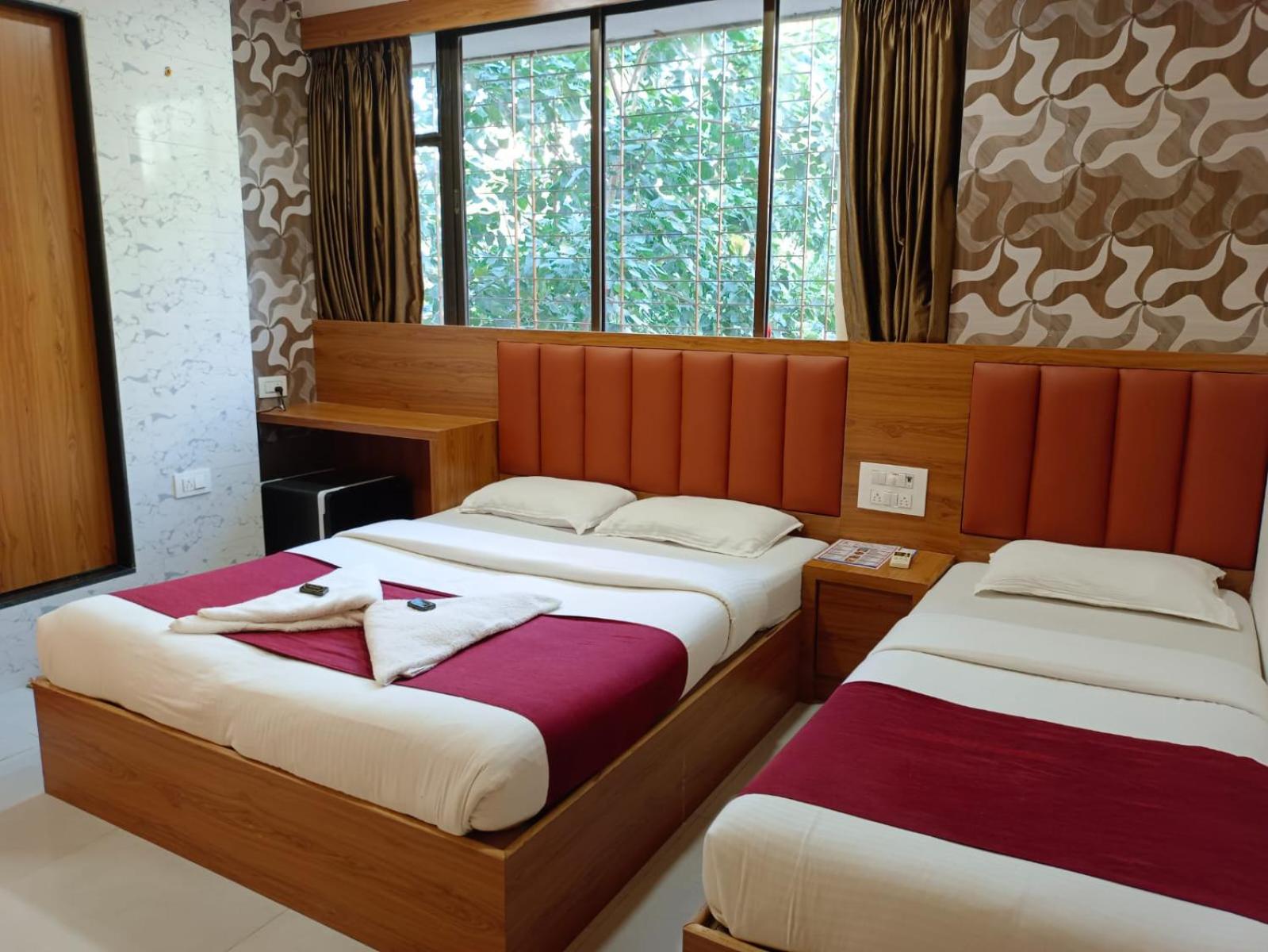 Deluxe Triple Room - Photo 13