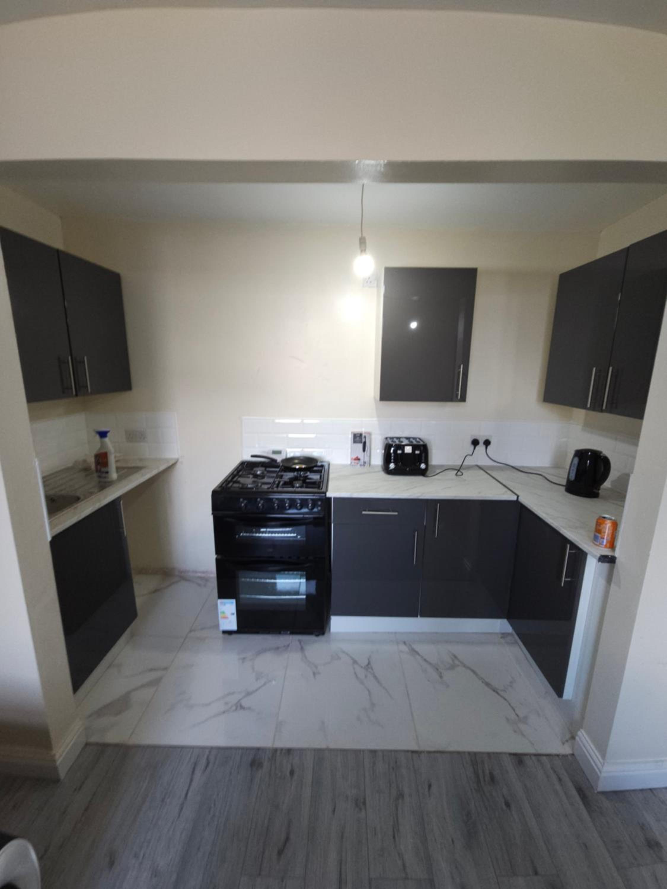 Three-Bedroom Apartment photo 2