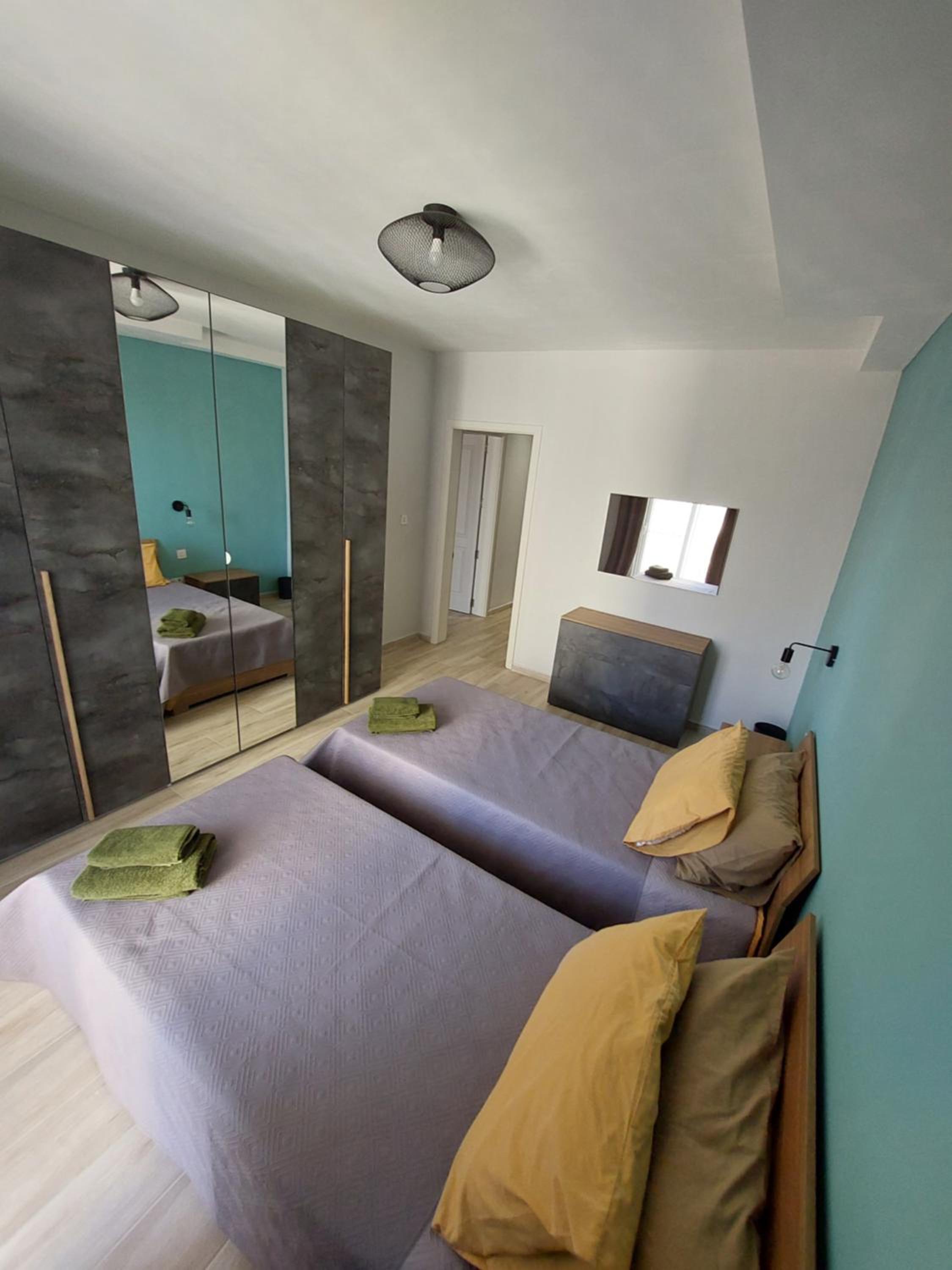 Three-Bedroom Apartment with Balcony photo 2