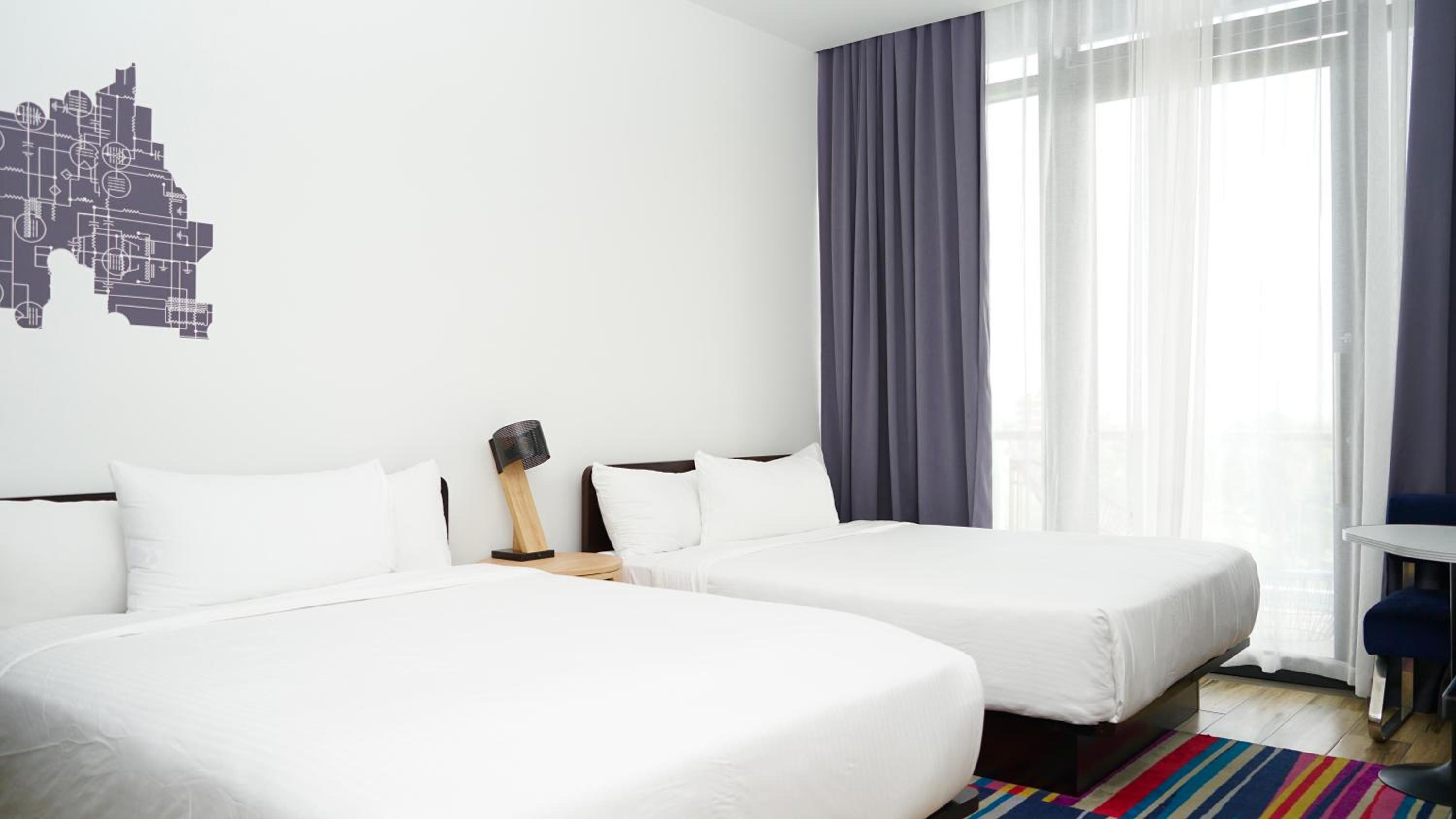 Guest Room with Two Queen Beds and Balcony - Photo 1