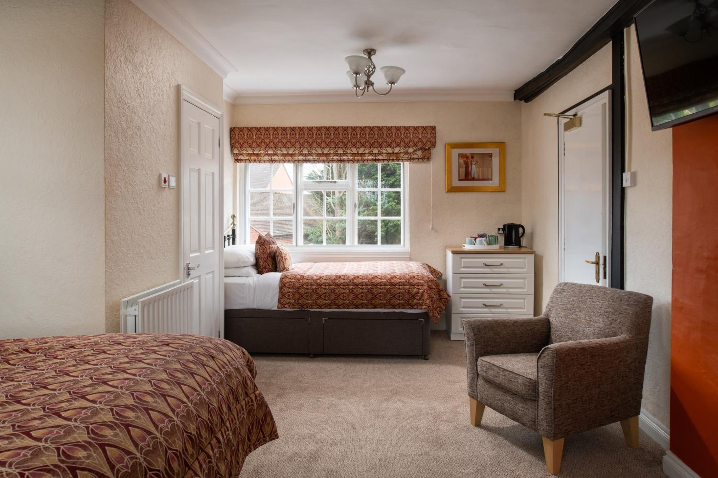 Deluxe Triple Room - Photo 8