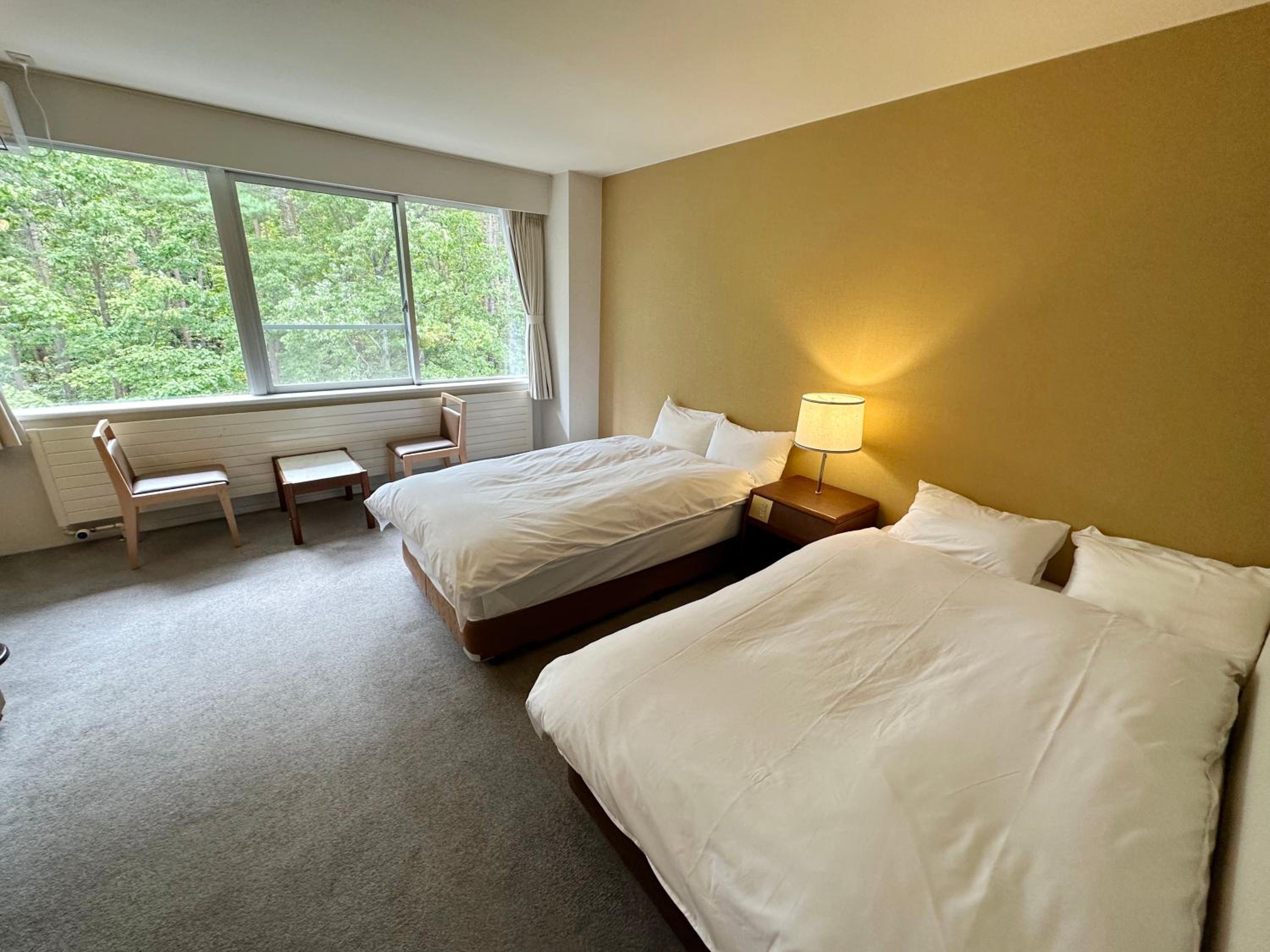 Standard Twin Room - Photo 8