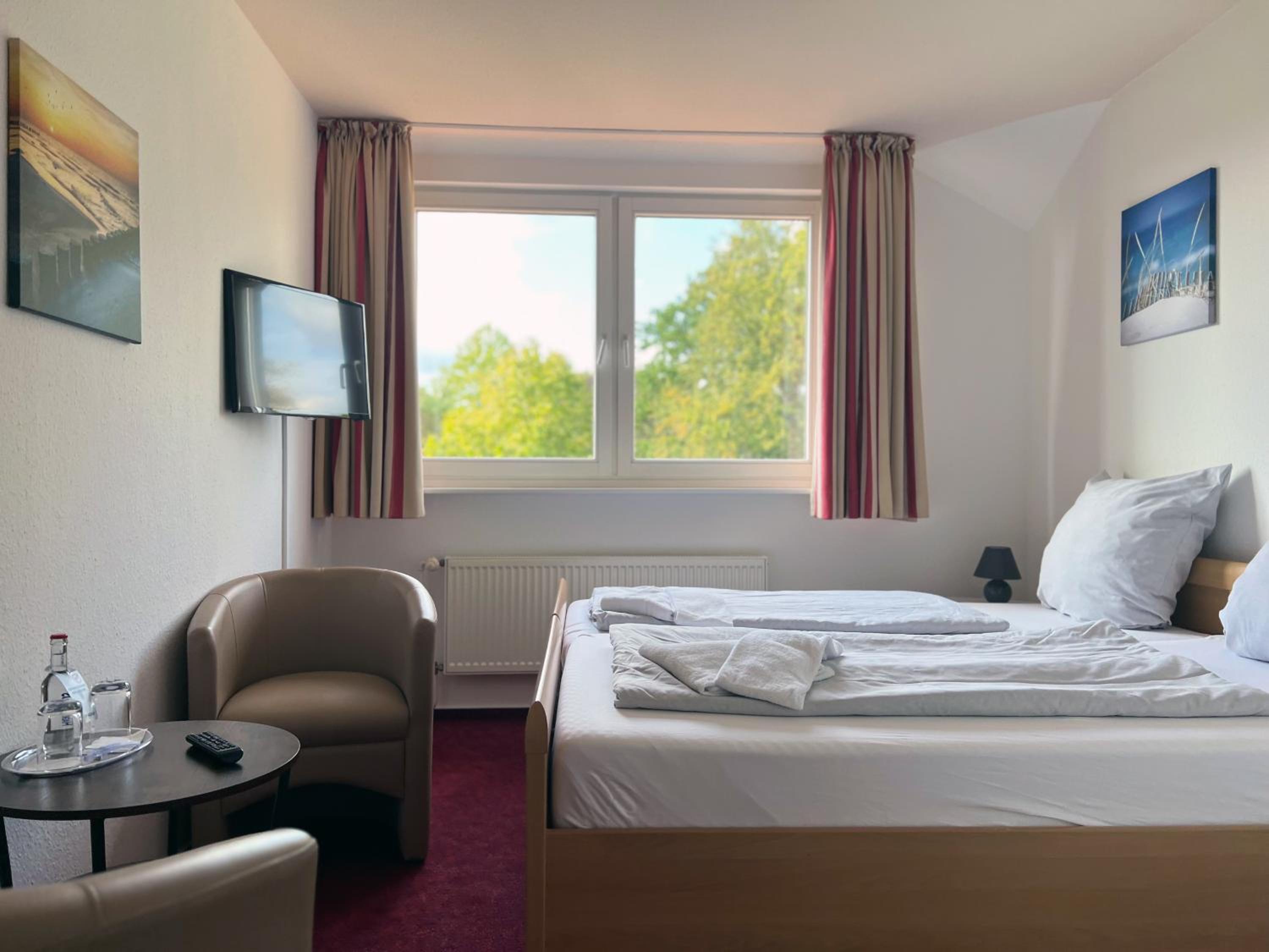 Double Room Standard Land Side 15qm - 17qm photo 1