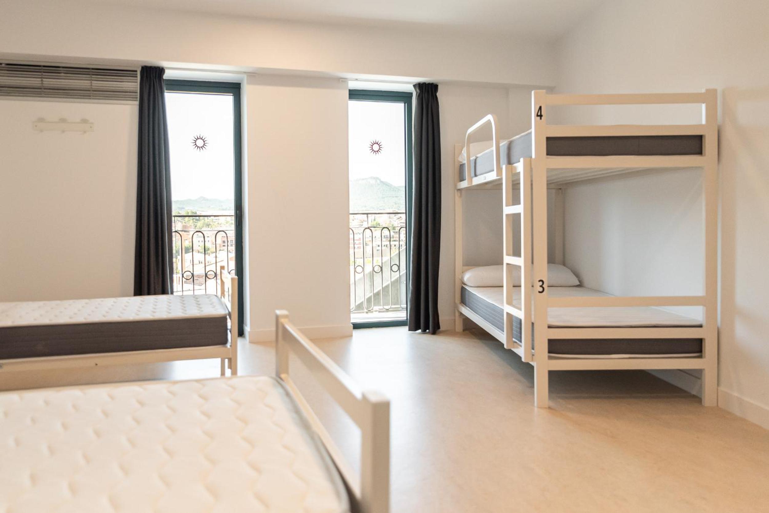 Cama individual en habitación compartida