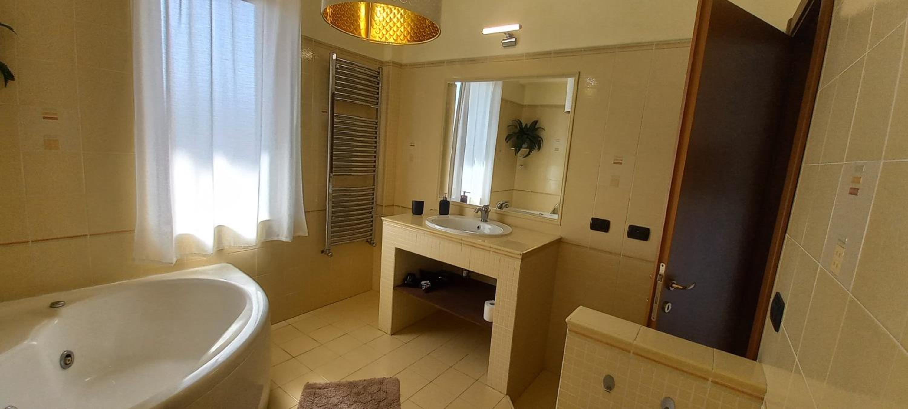 Three-Bedroom Apartment - Photo 32