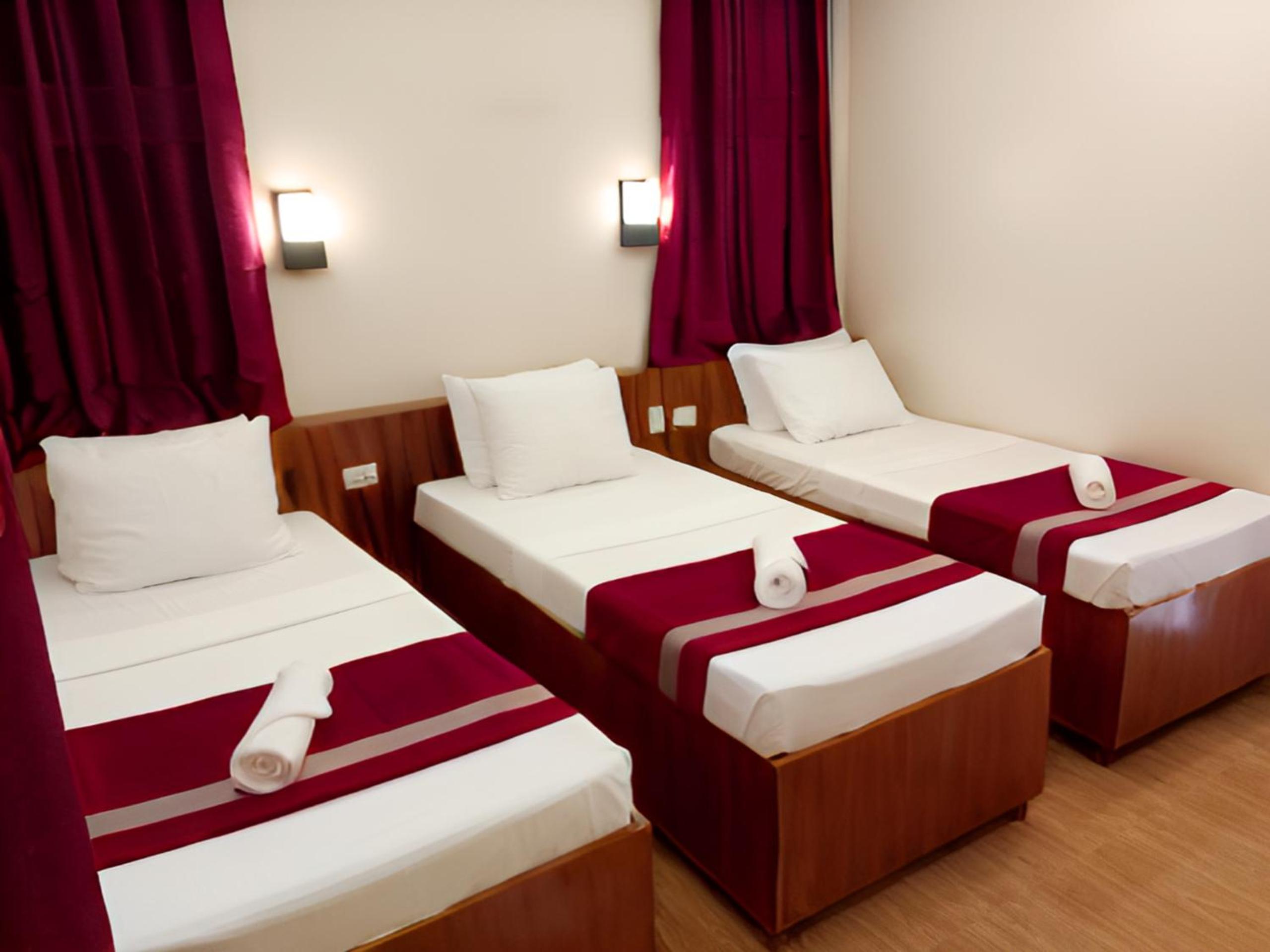 Standard Triple Room - Photo 7