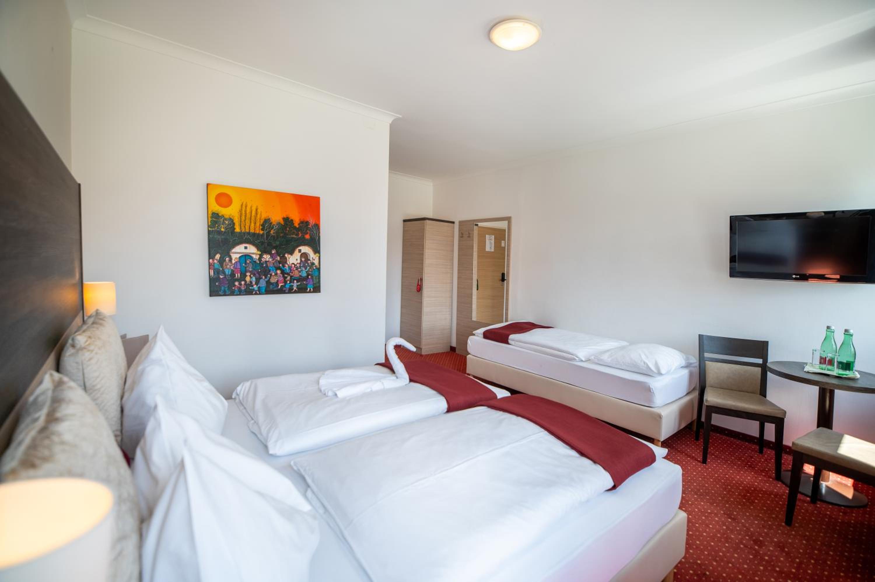 Triple Room - Photo 1