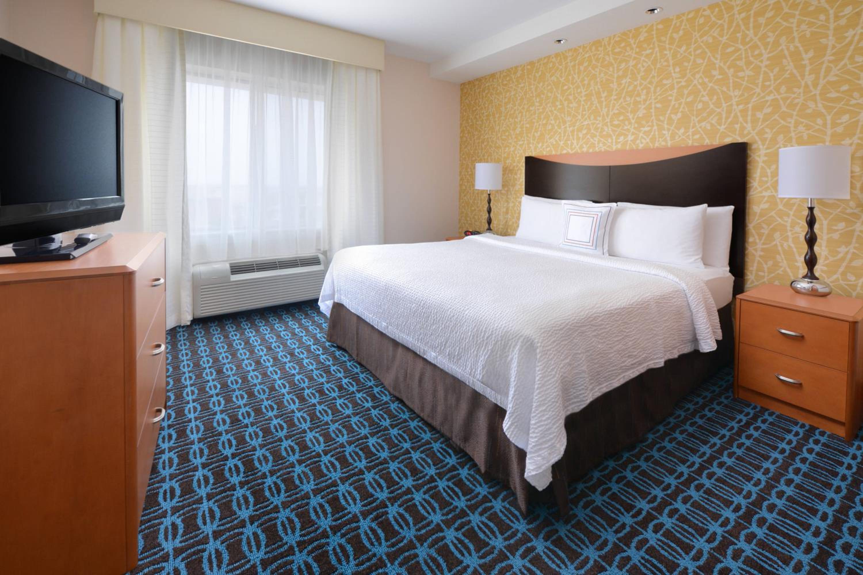 Larger Suite, 1 King, Sofa bed (Mobility & Hearing Accessible w/ Roll-in Shower)