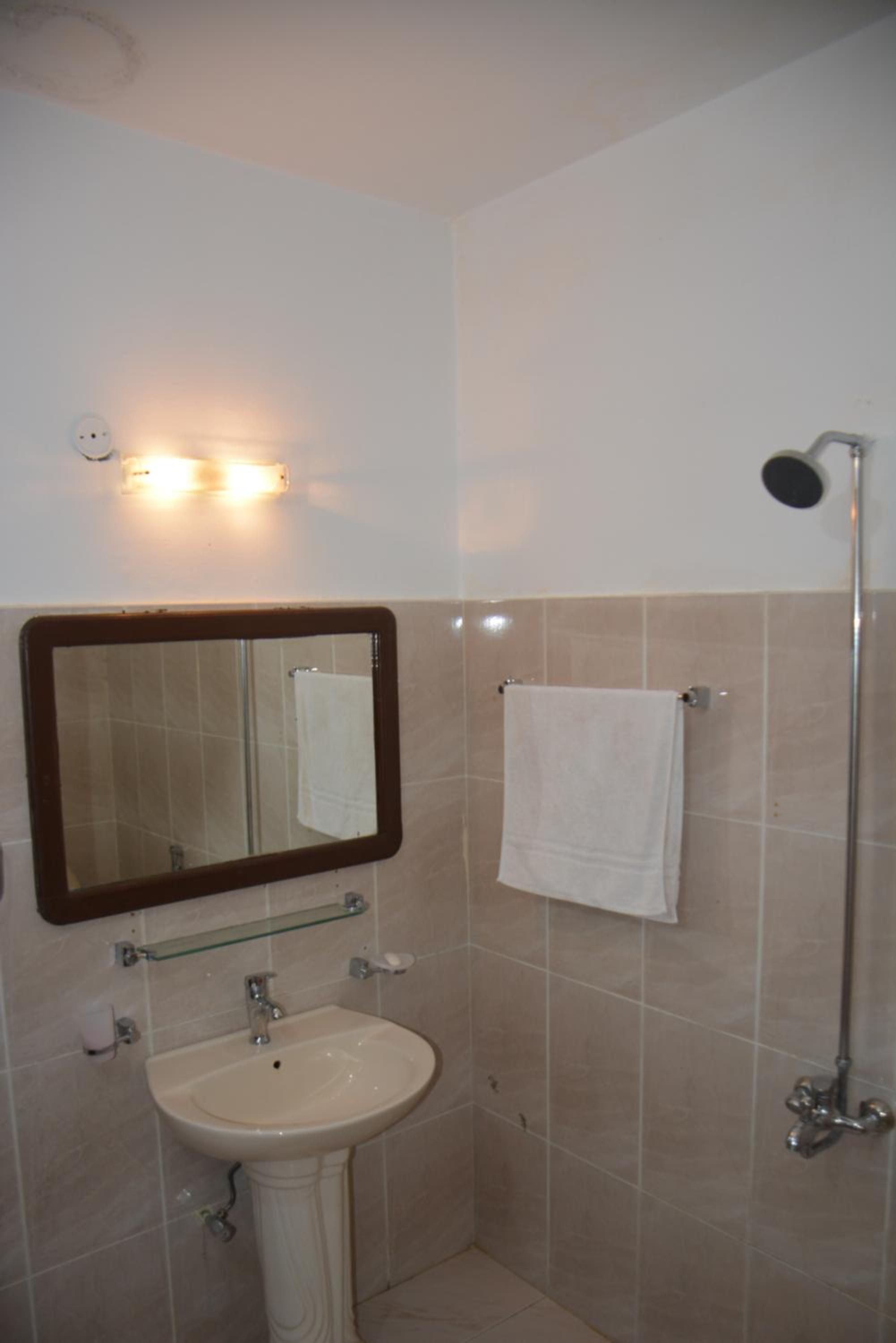 Three-Bedroom Apartment photo 2