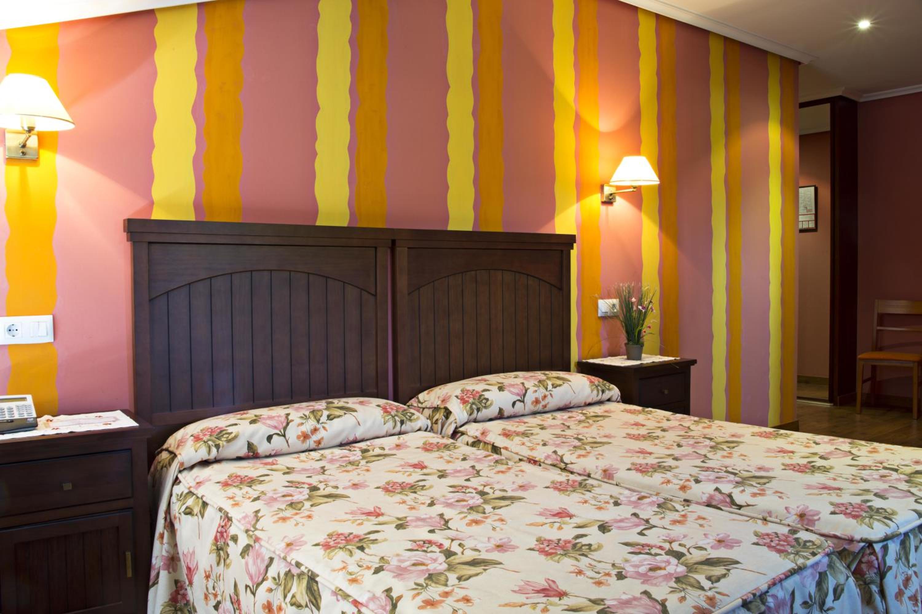 Habitación Cuádruple (2 Adultos + 2 Niños)