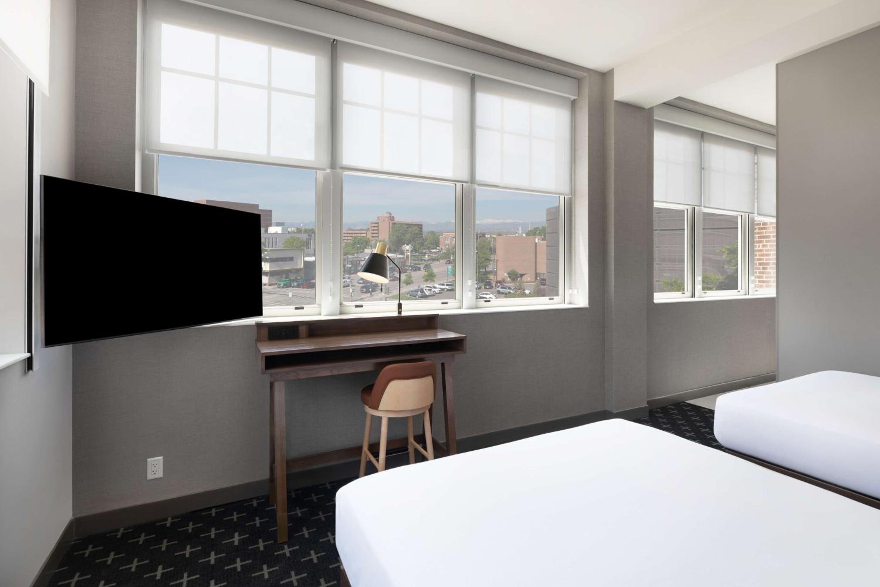 Corner Queen Room with Two Queen Beds and Mountain View - Photo 1