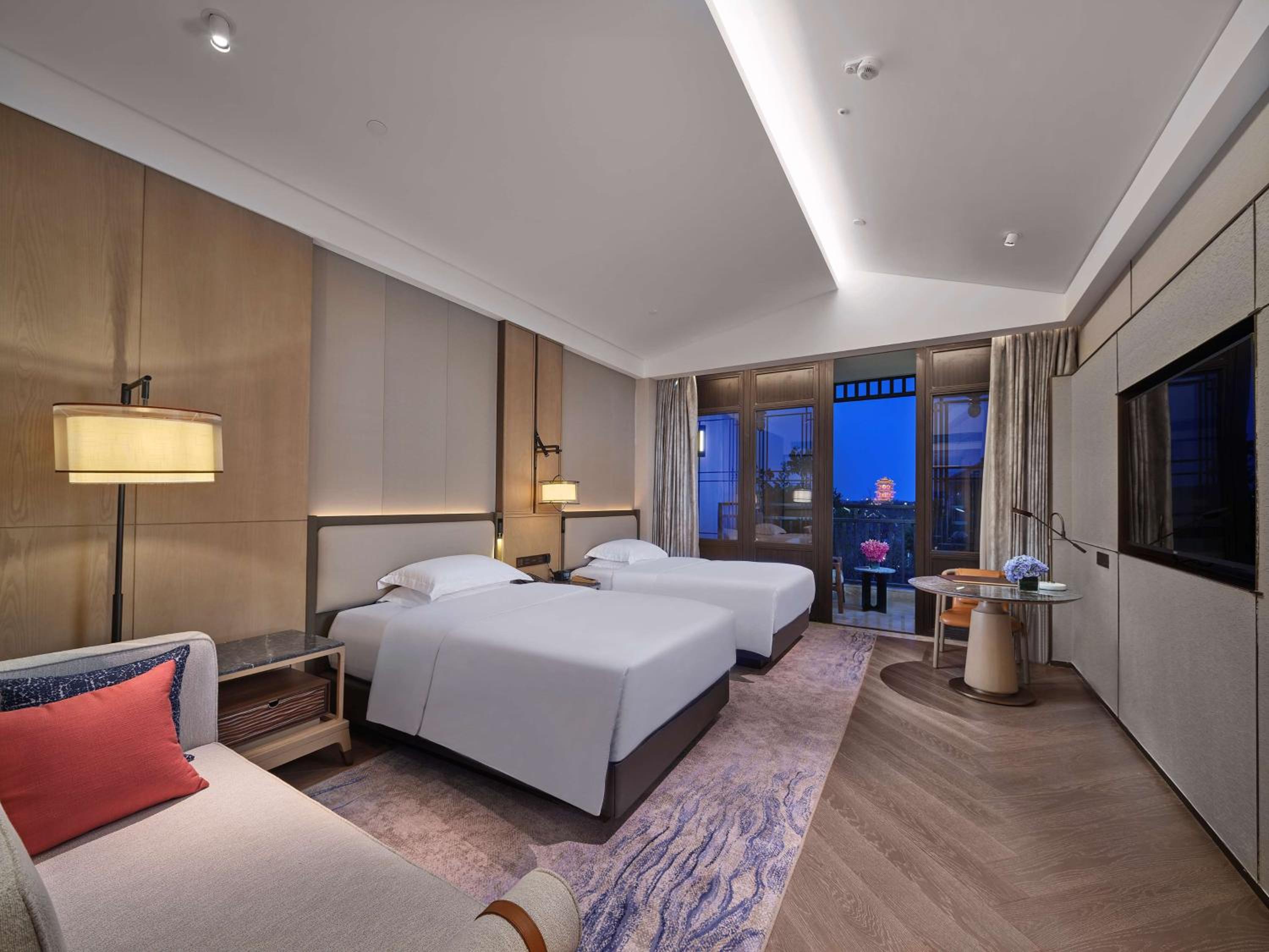 Deluxe Twin Room with Balcony and Garden View - Photo 1