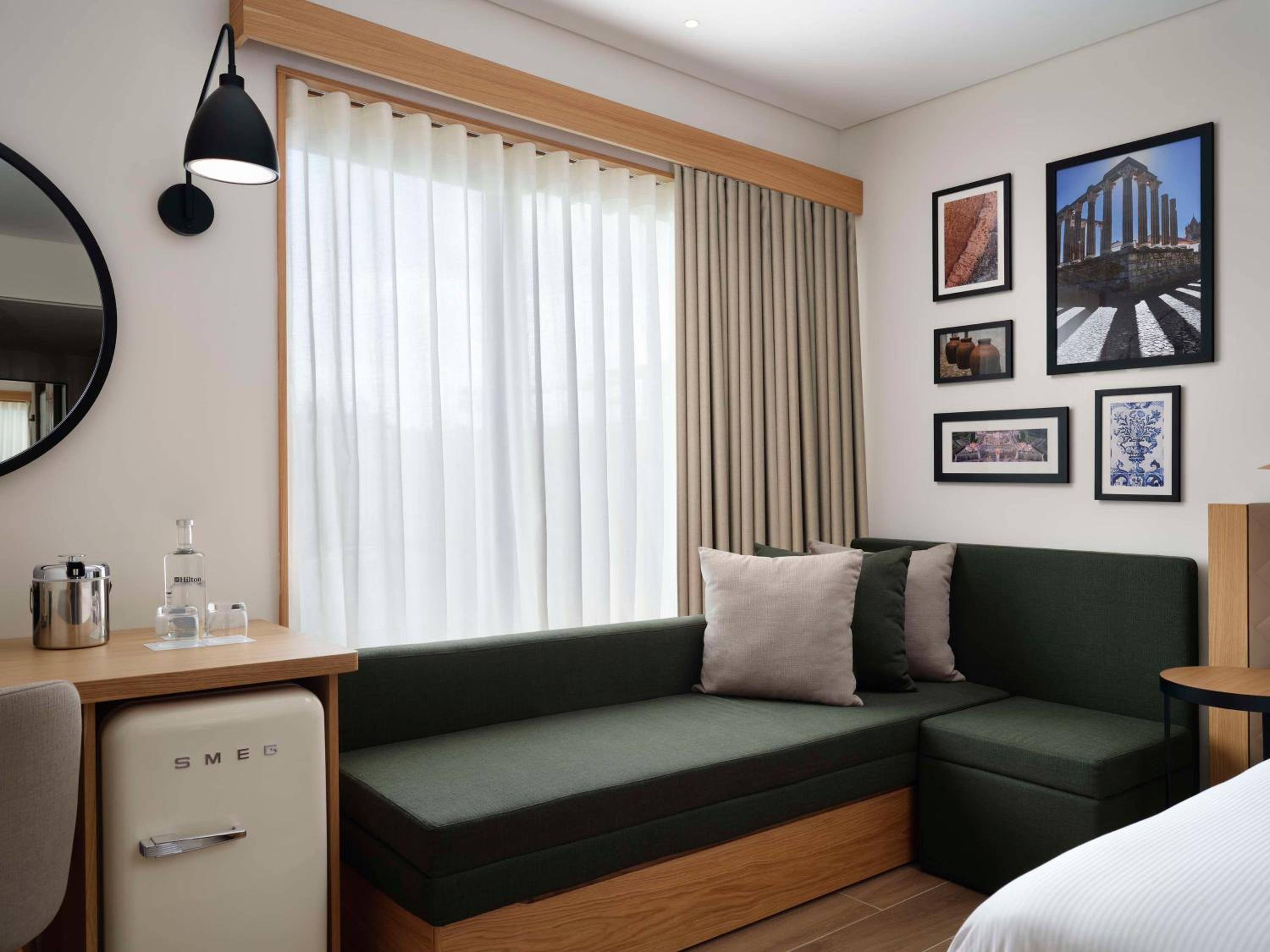 Deluxe King Room with Sofa Bed - Photo 1