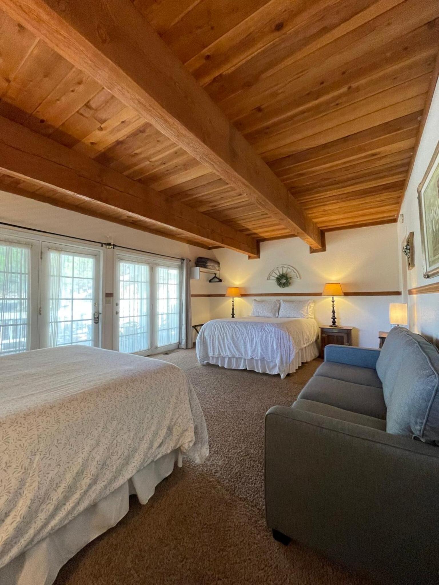 Deluxe Queen Room with Two Queen Beds and Private Bathroom