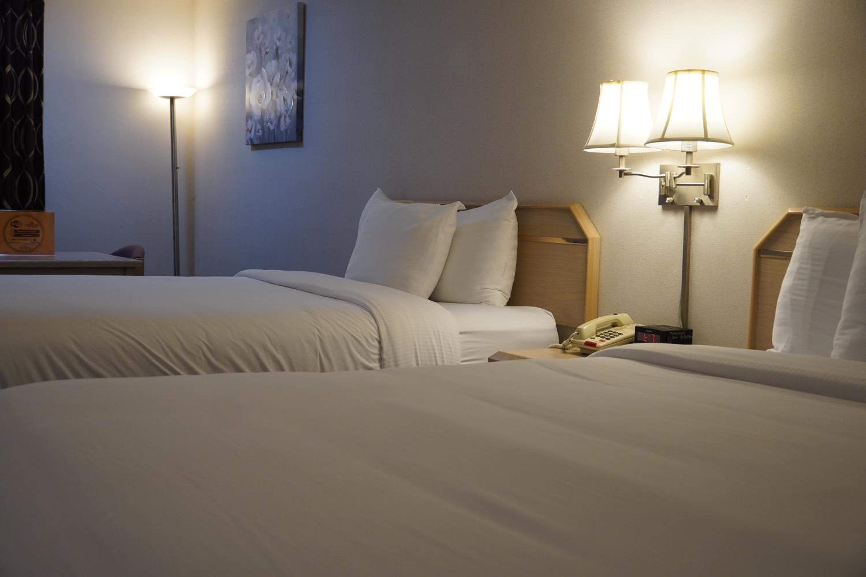 Queen Room with Two Queen Beds - Photo 1