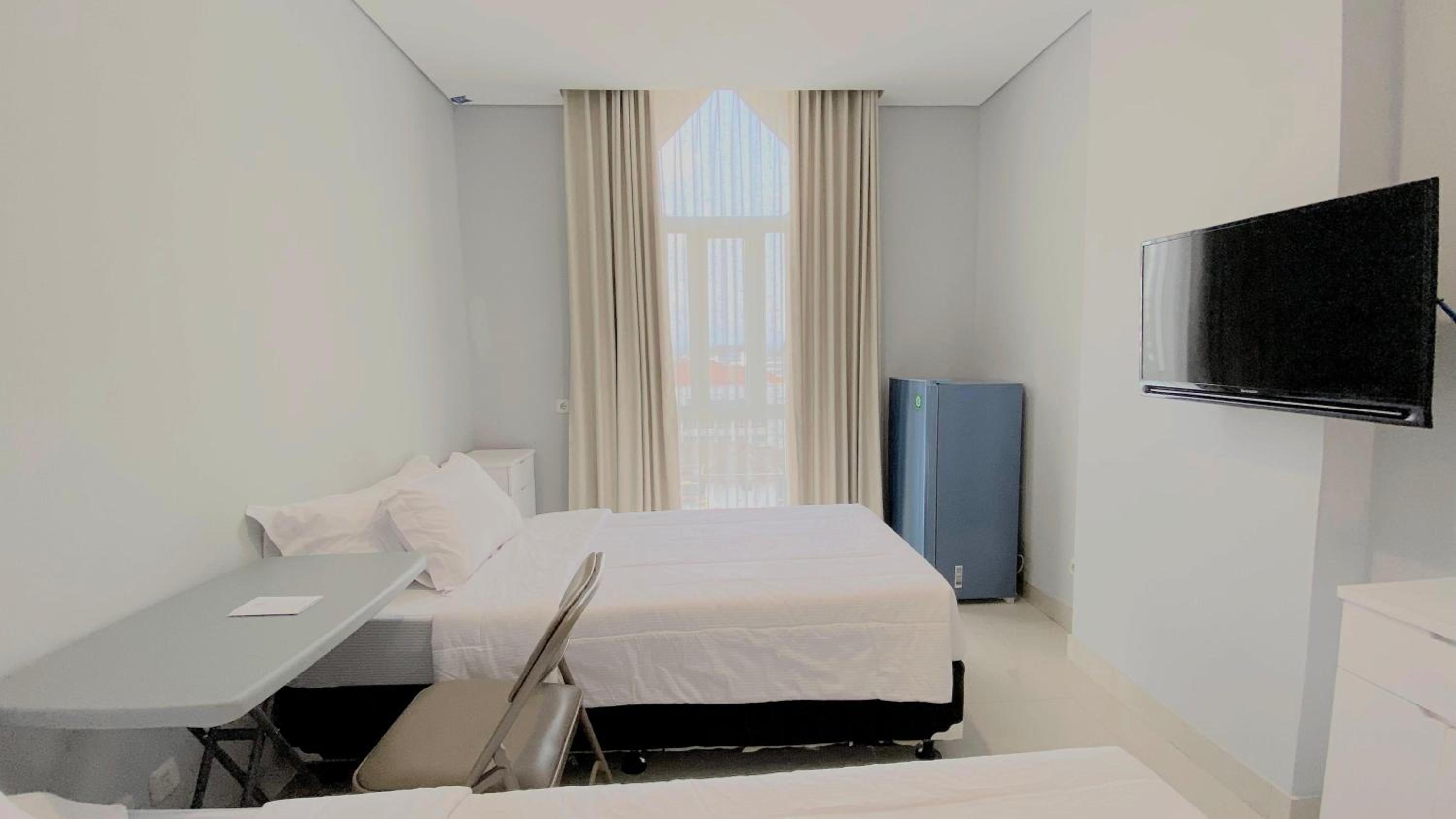 Economy Twin Room - Photo 2