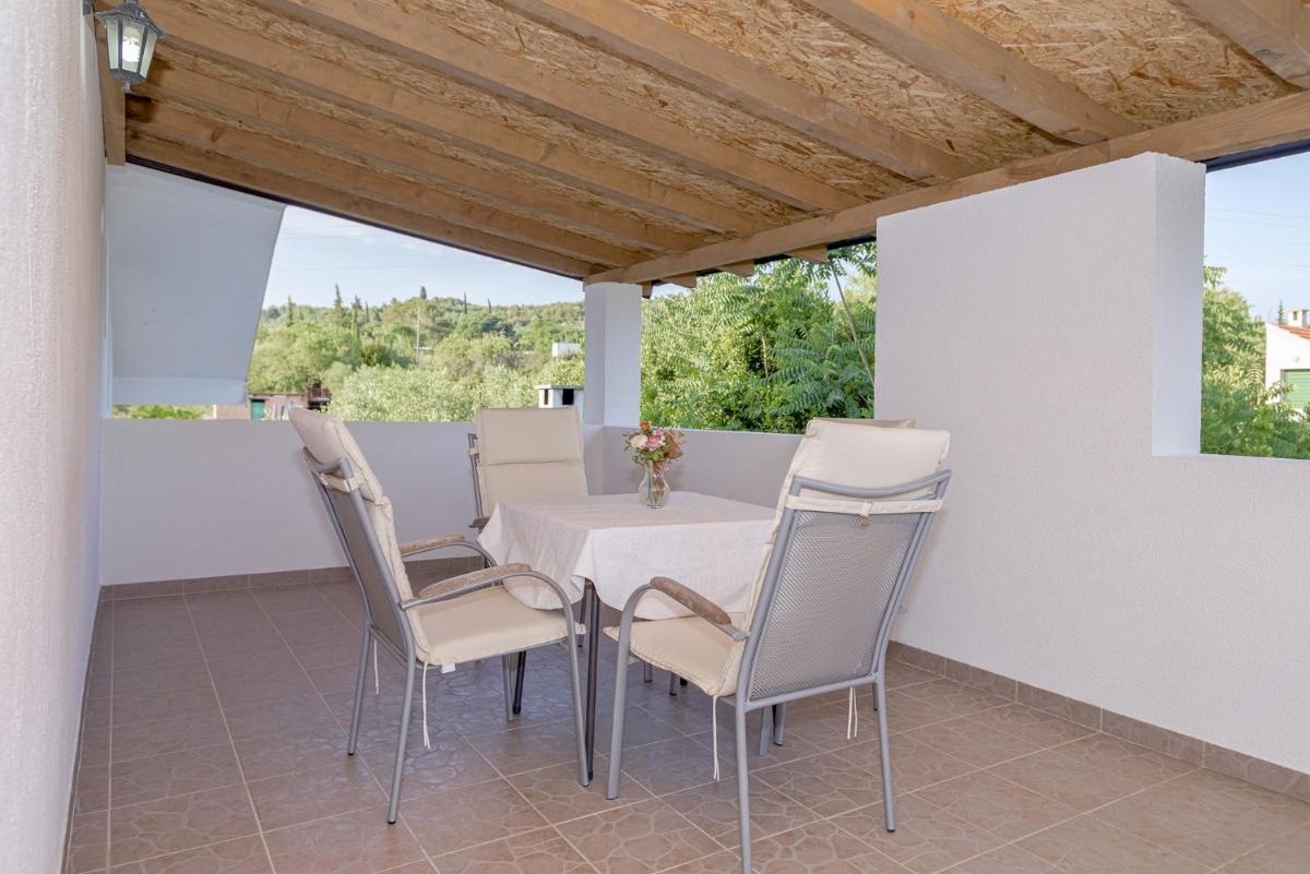 One-Bedroom Apartment with Balcony and City View - Photo 3