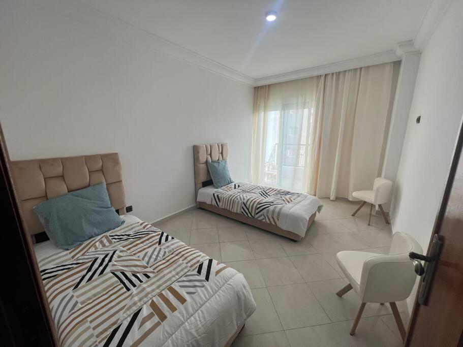 Three-Bedroom Apartment photo 1
