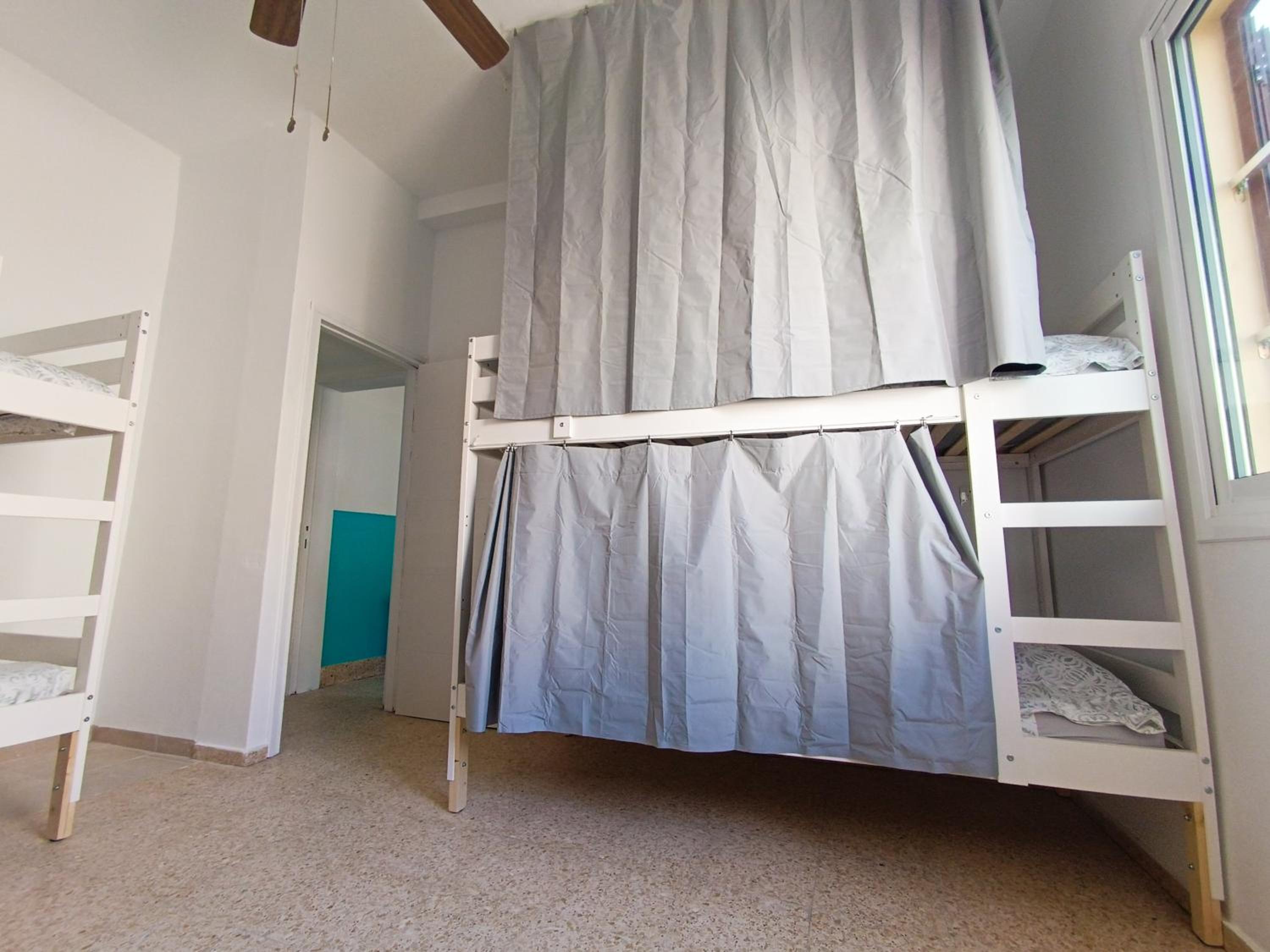 Cama en Habitación Compartida Mixta de 8 Camas