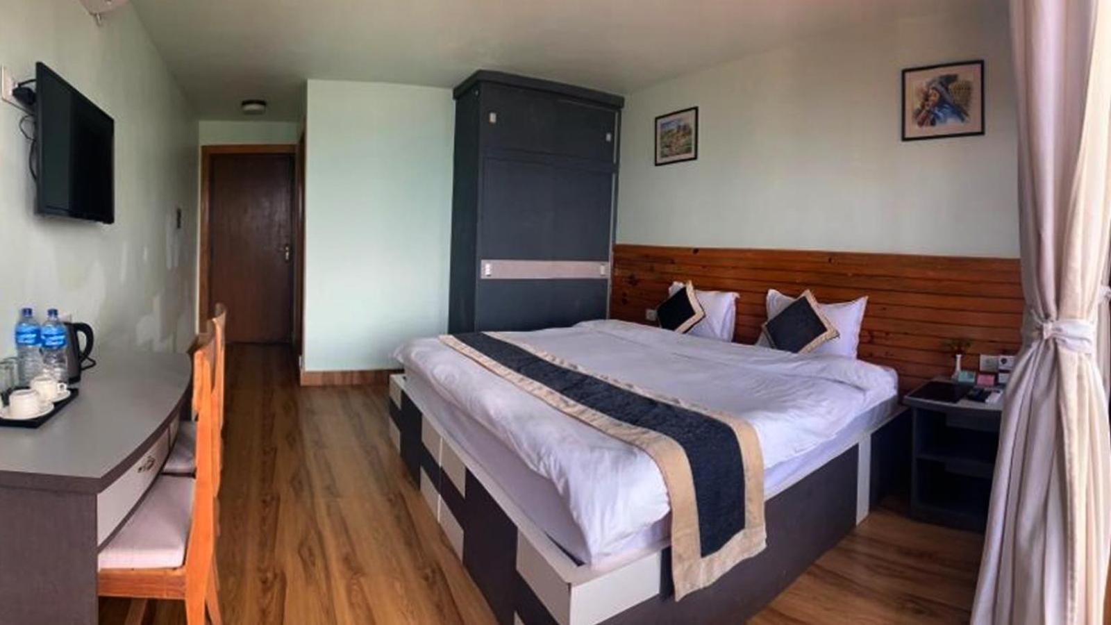 Deluxe Room - Photo 6