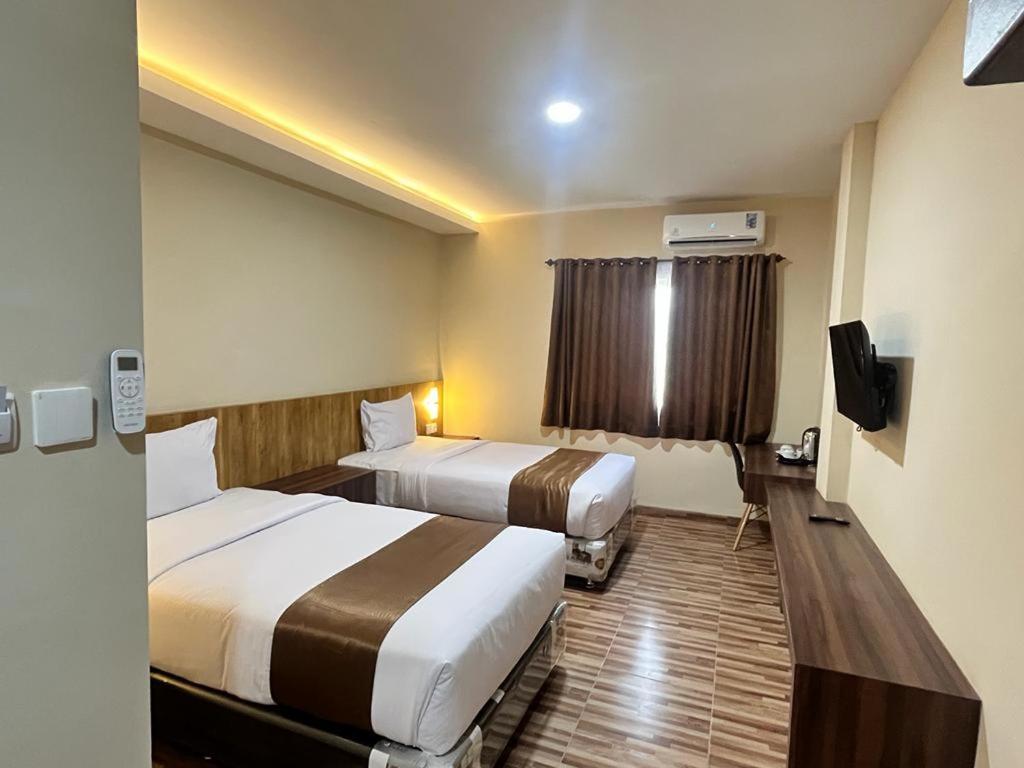 Deluxe King Room - Photo 1
